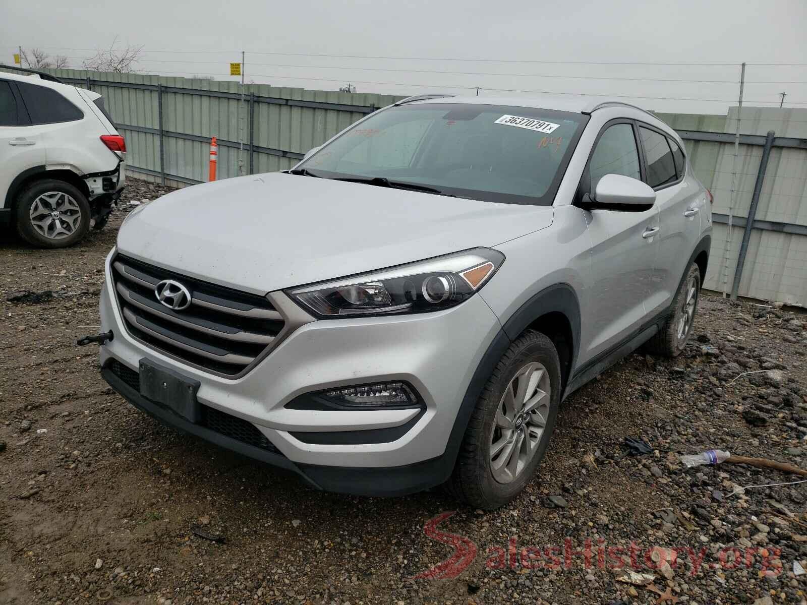 KM8J3CA42GU179901 2016 HYUNDAI TUCSON