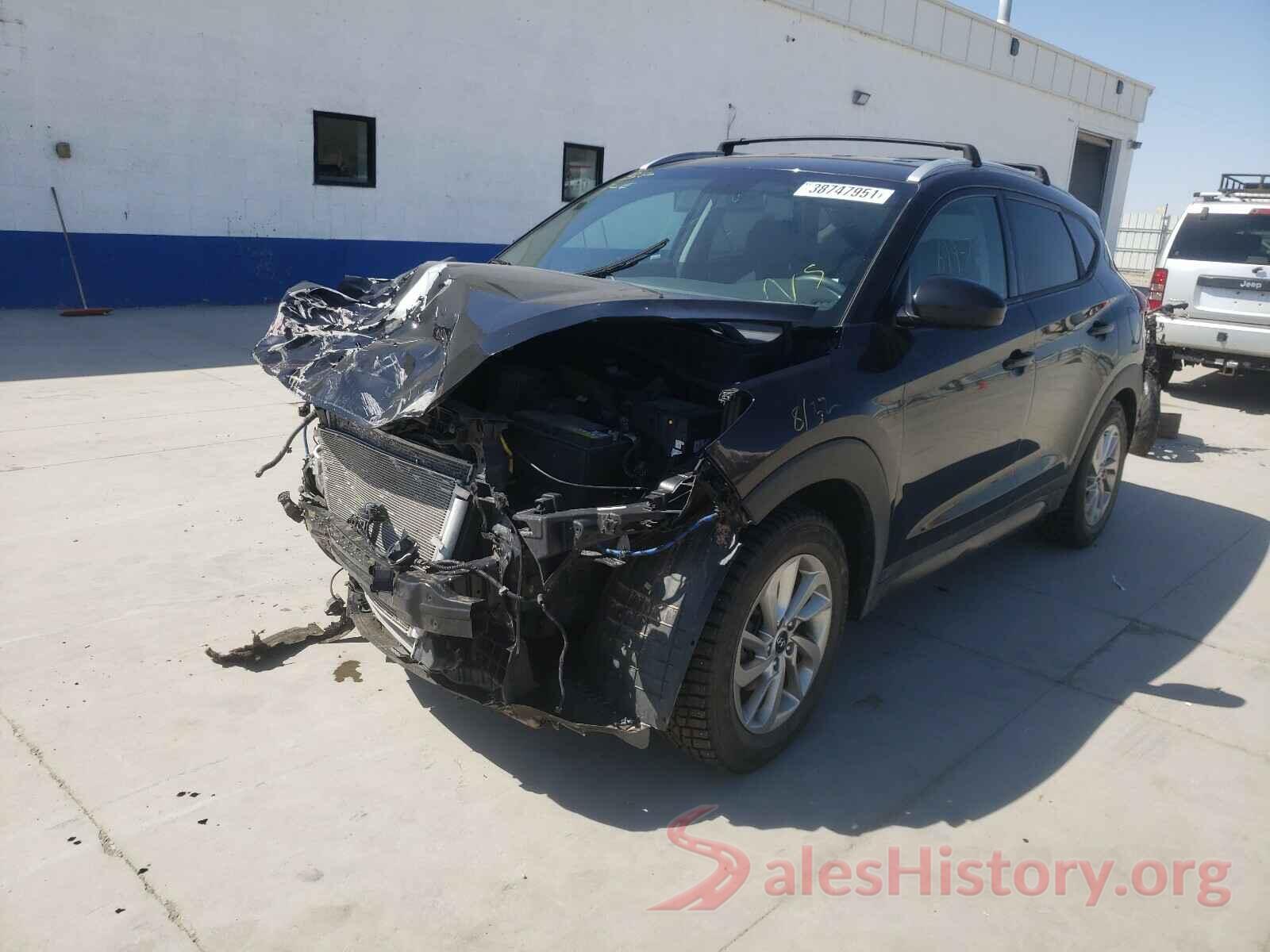 KM8J3CA44GU035962 2016 HYUNDAI TUCSON