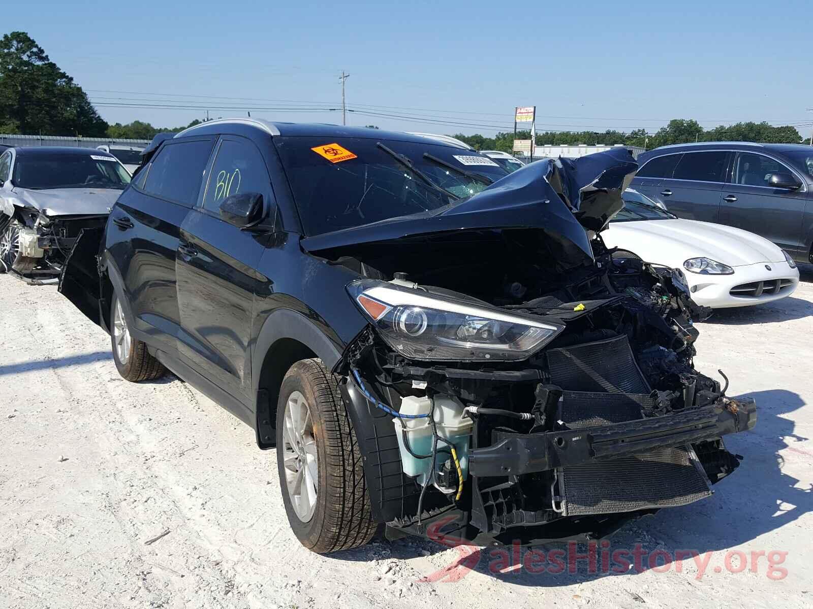 KM8J3CA42GU059063 2016 HYUNDAI TUCSON