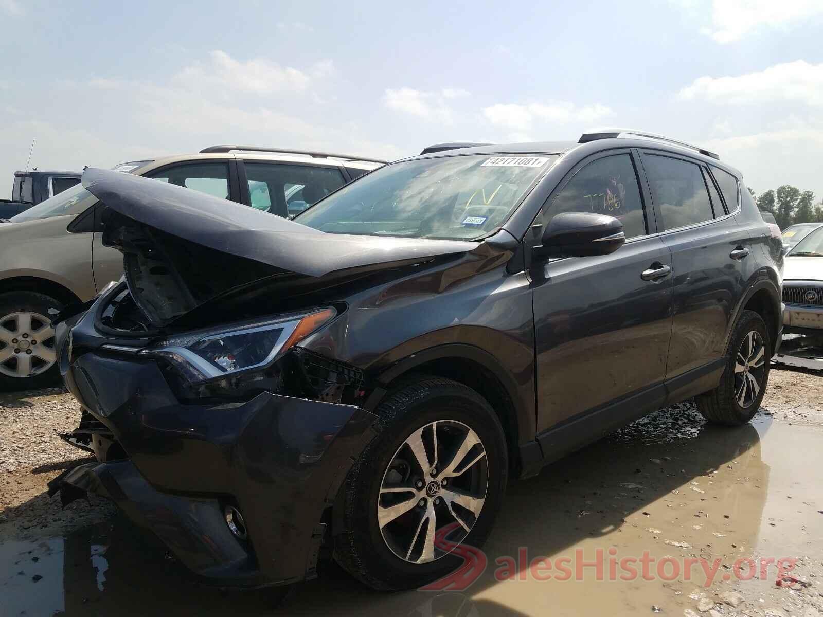 JTMWFREV8JJ722703 2018 TOYOTA RAV4