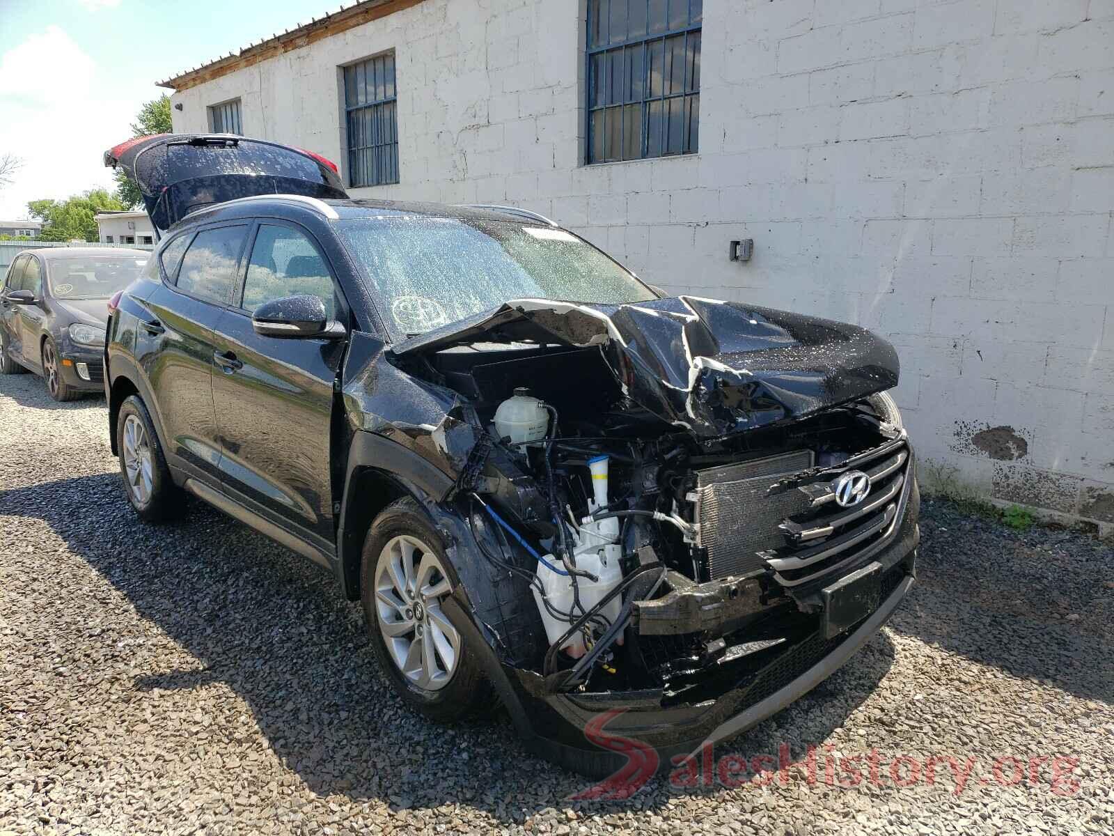 KM8J3CA2XGU063778 2016 HYUNDAI TUCSON