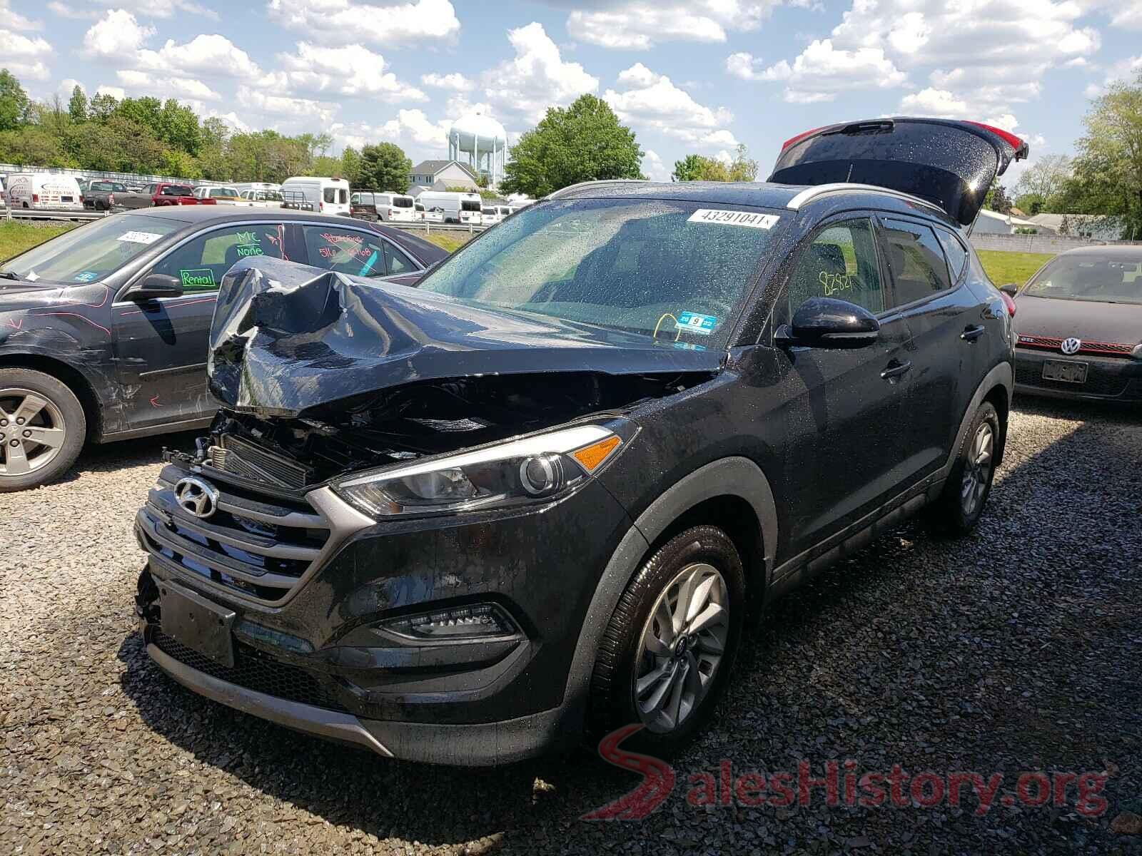 KM8J3CA2XGU063778 2016 HYUNDAI TUCSON