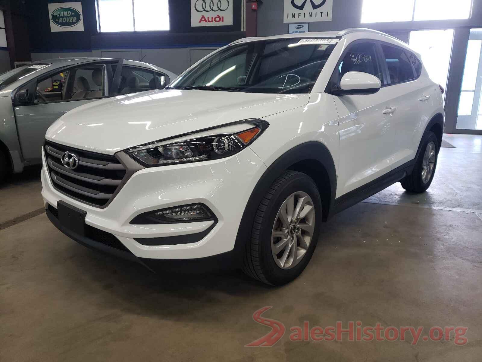 KM8J3CA42GU104986 2016 HYUNDAI TUCSON