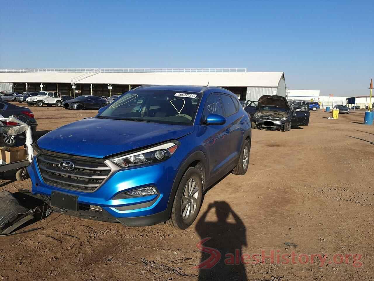 KM8J3CA44GU082165 2016 HYUNDAI TUCSON