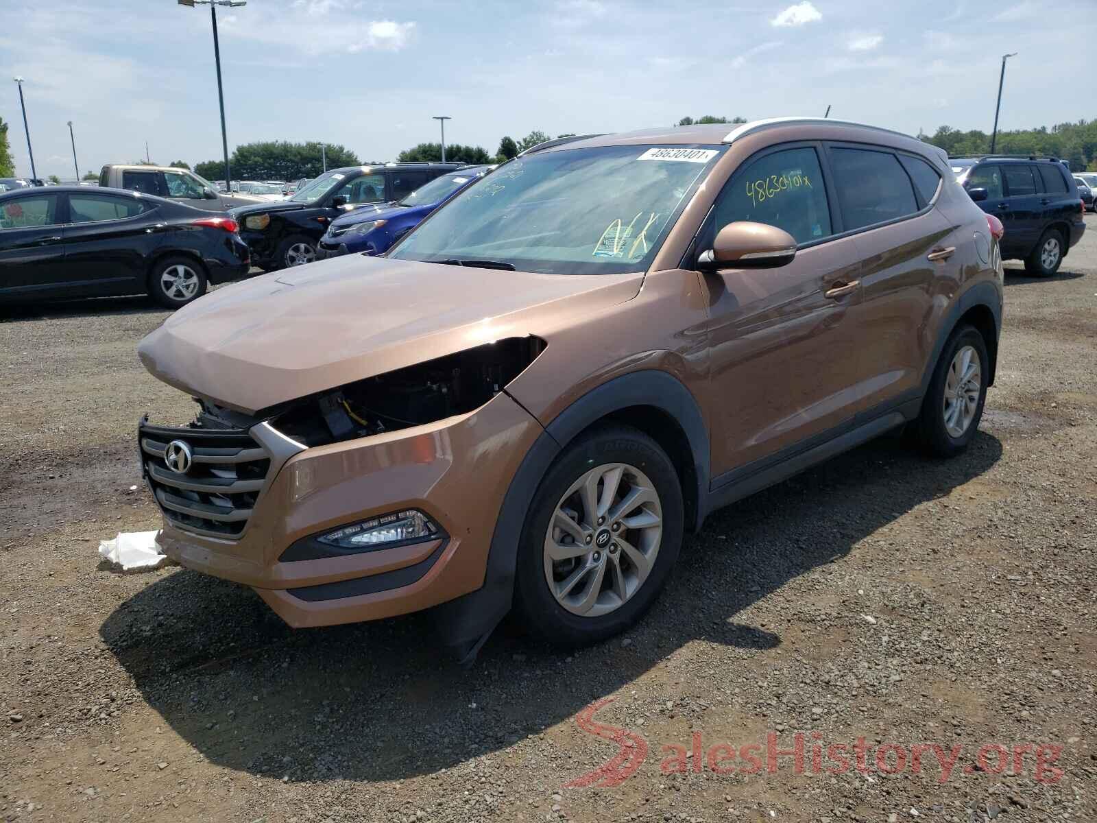 KM8J3CA26GU184954 2016 HYUNDAI TUCSON