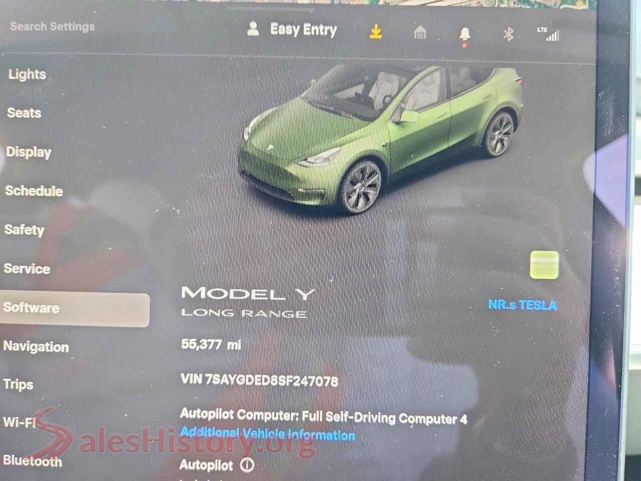 2025 TESLA MODEL Y VIN 7SAYGDED8SF247078, interior center console