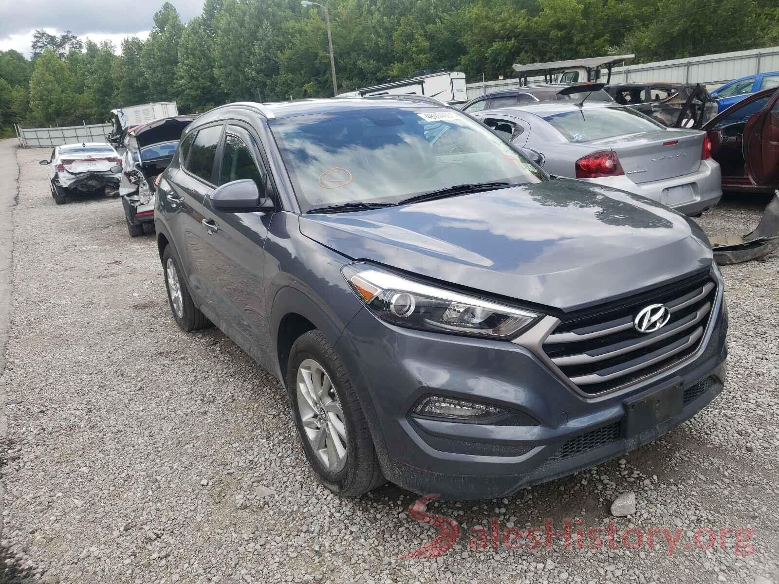 KM8J3CA49GU242931 2016 HYUNDAI TUCSON