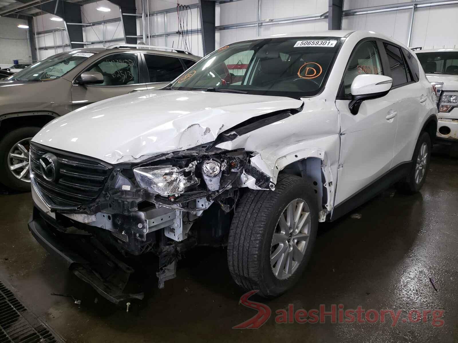 JM3KE4CYXG0658977 2016 MAZDA CX-5