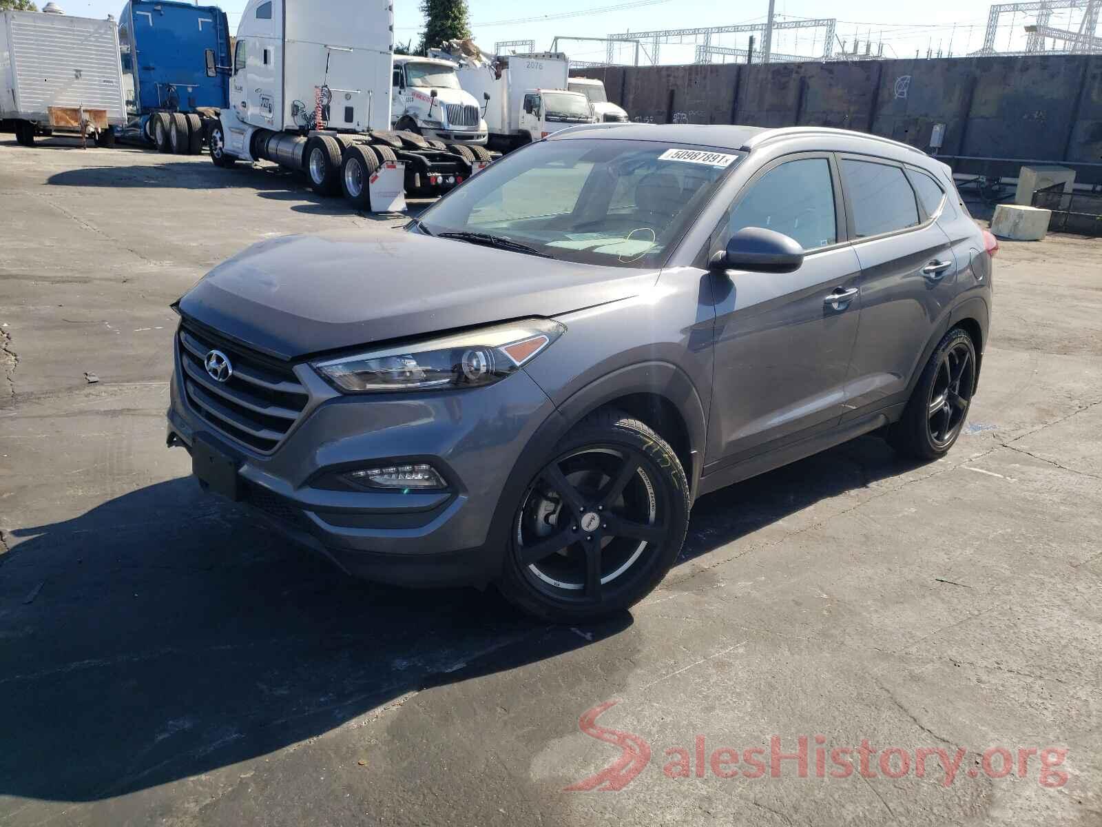 KM8J33A40GU188211 2016 HYUNDAI TUCSON