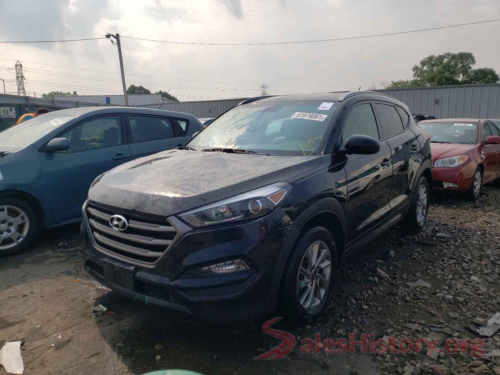 KM8J3CA46GU129597 2016 HYUNDAI TUCSON