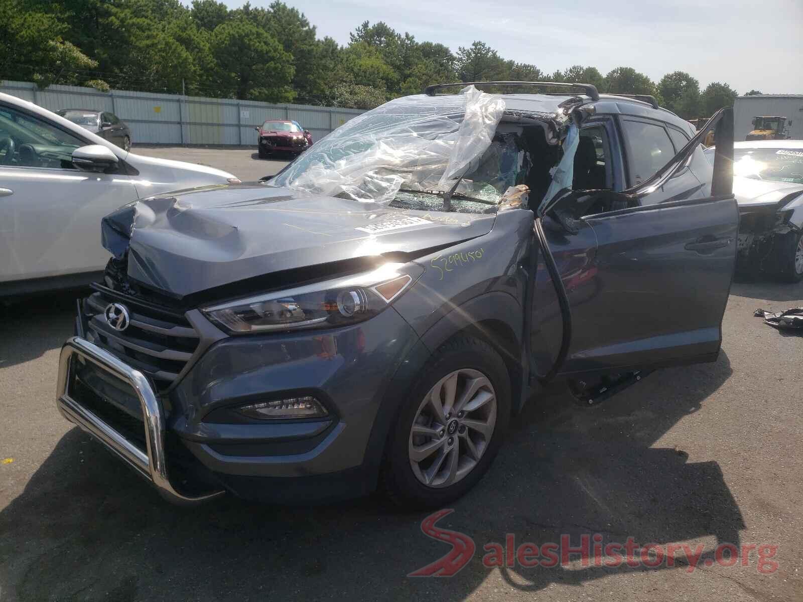 KM8J3CA43GU057077 2016 HYUNDAI TUCSON