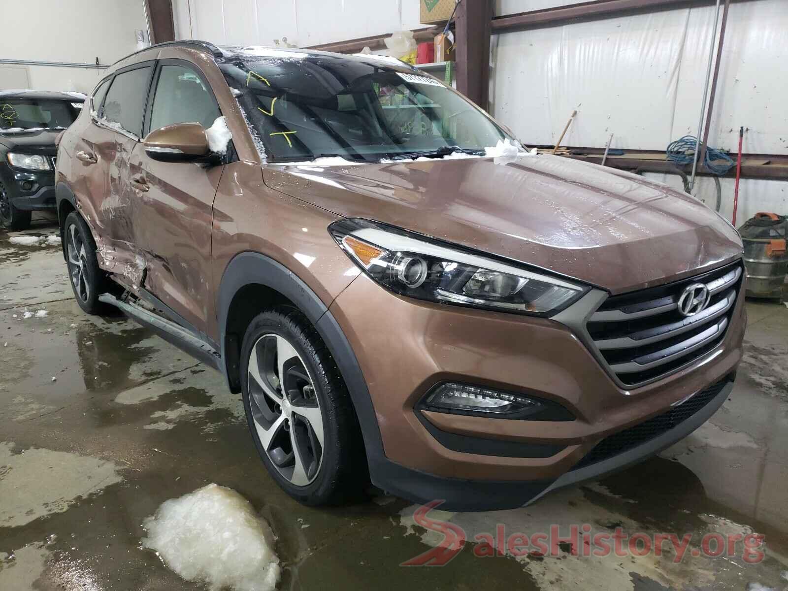 KM8J3CA2XGU049427 2016 HYUNDAI TUCSON