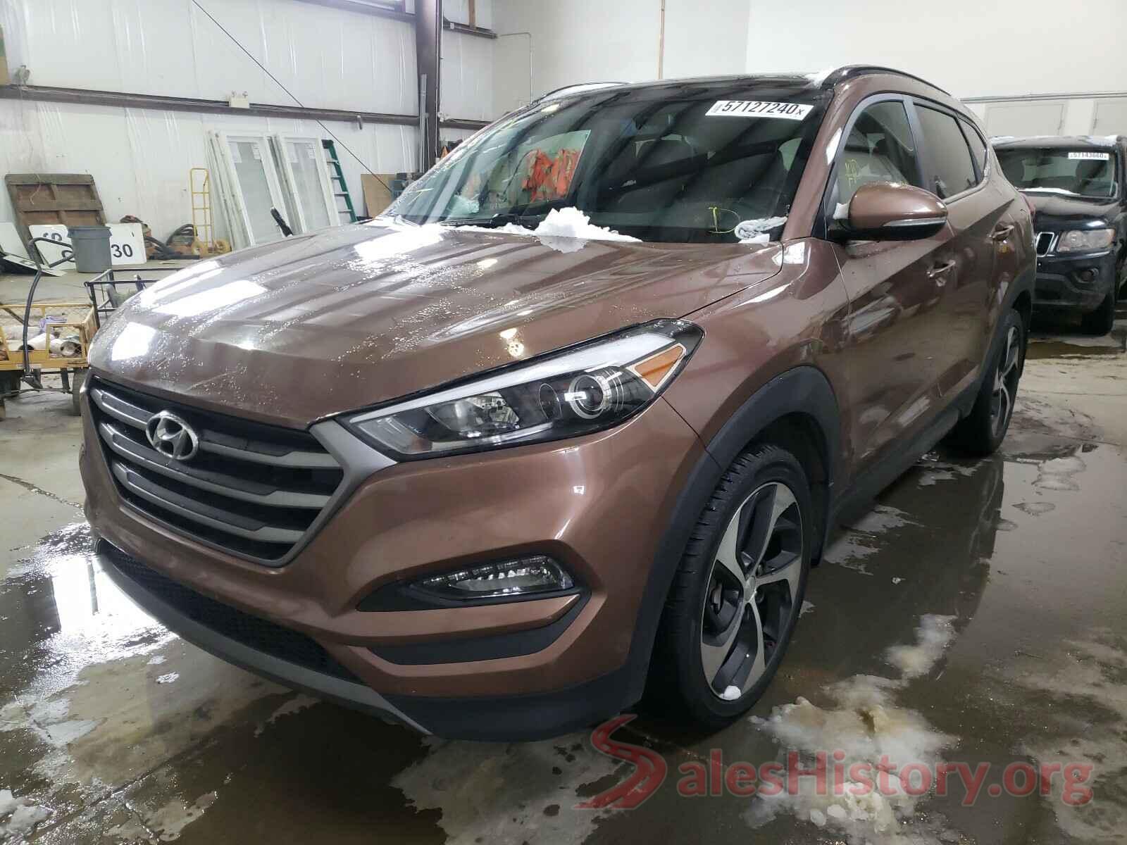 KM8J3CA2XGU049427 2016 HYUNDAI TUCSON