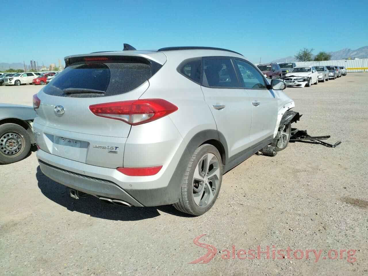 KM8J3CA2XGU027069 2016 HYUNDAI TUCSON