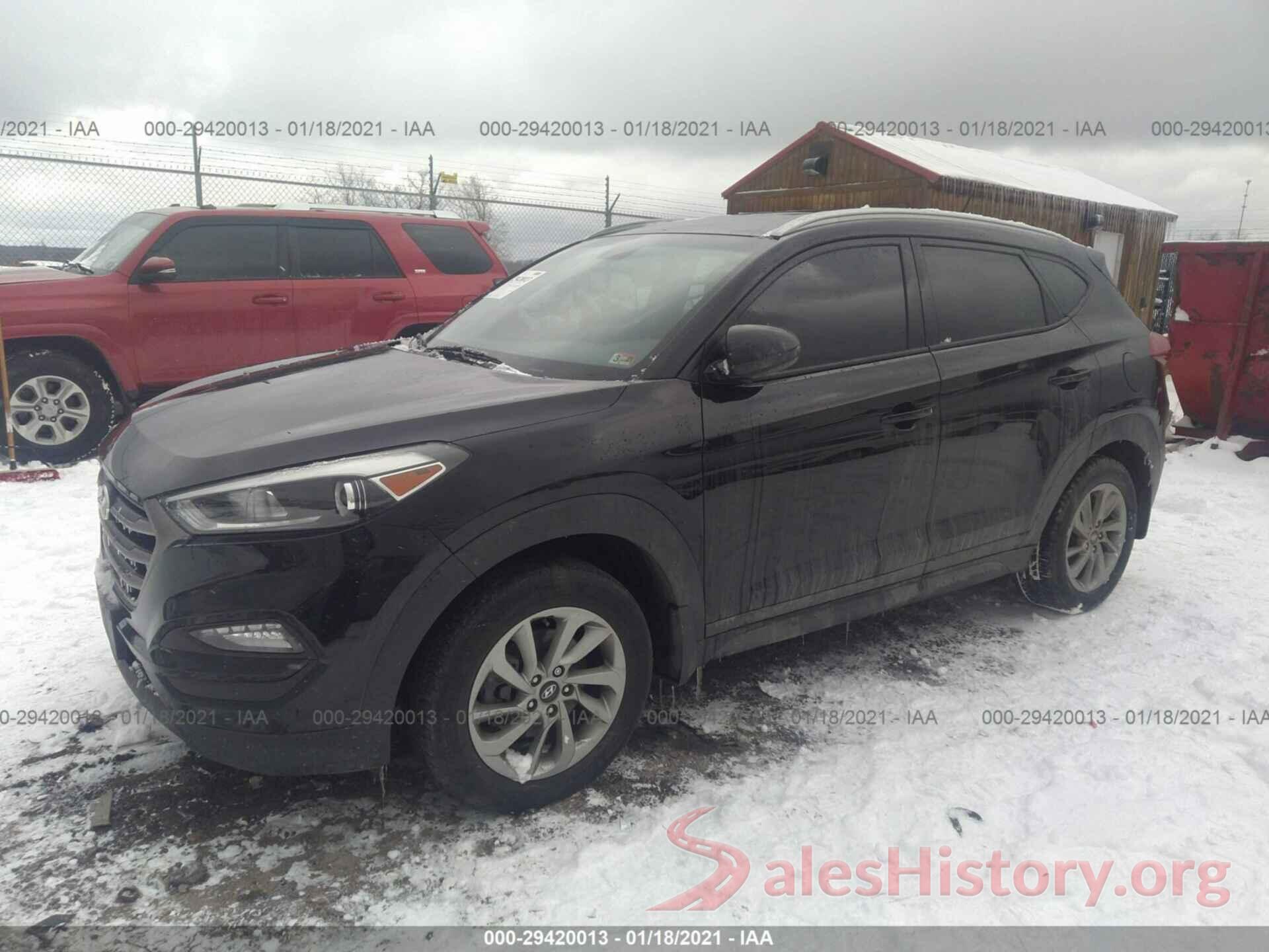 KM8J3CA44GU064863 2016 HYUNDAI TUCSON