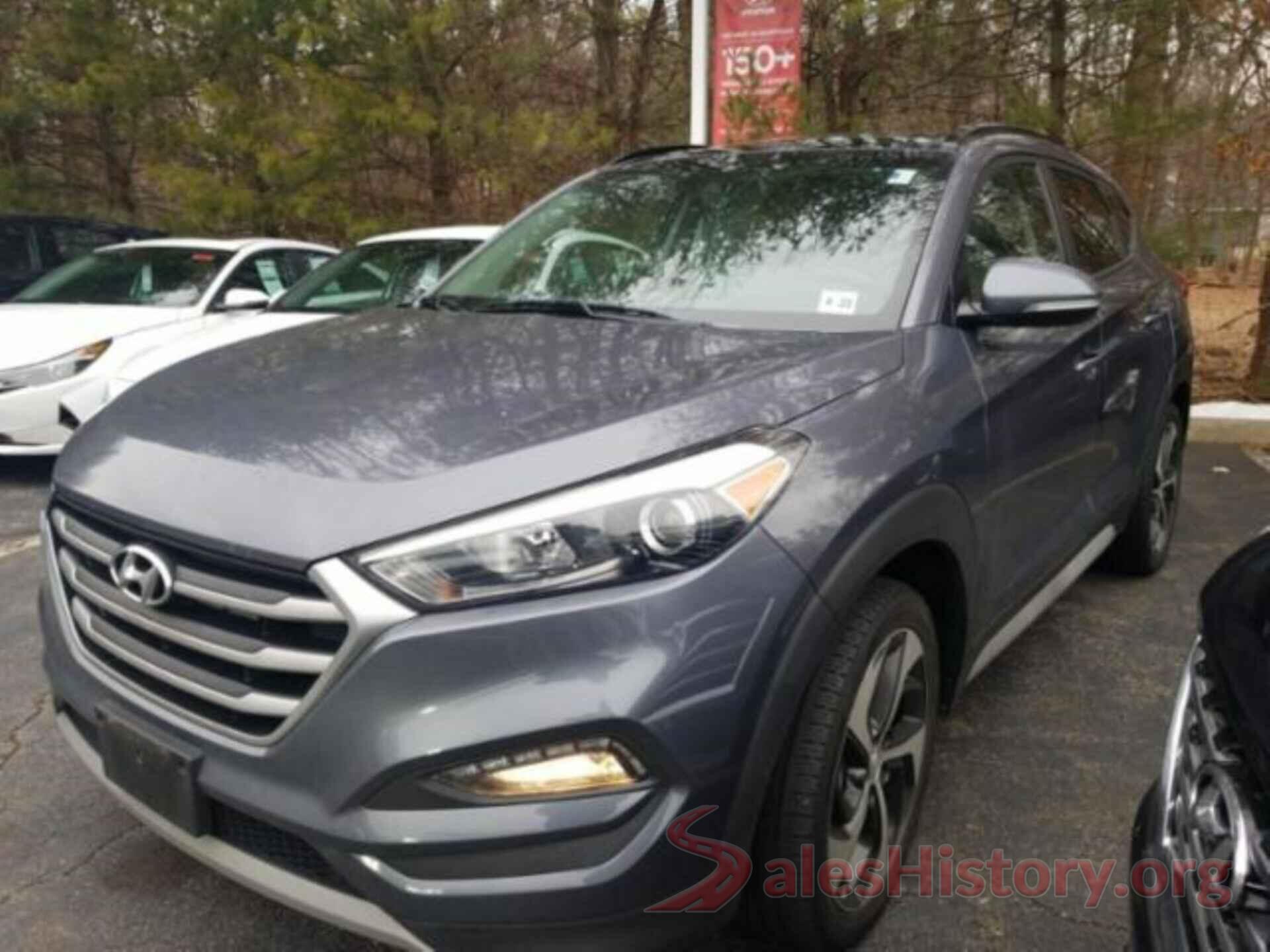 KM8J3CA26JU647263 2018 HYUNDAI TUCSON