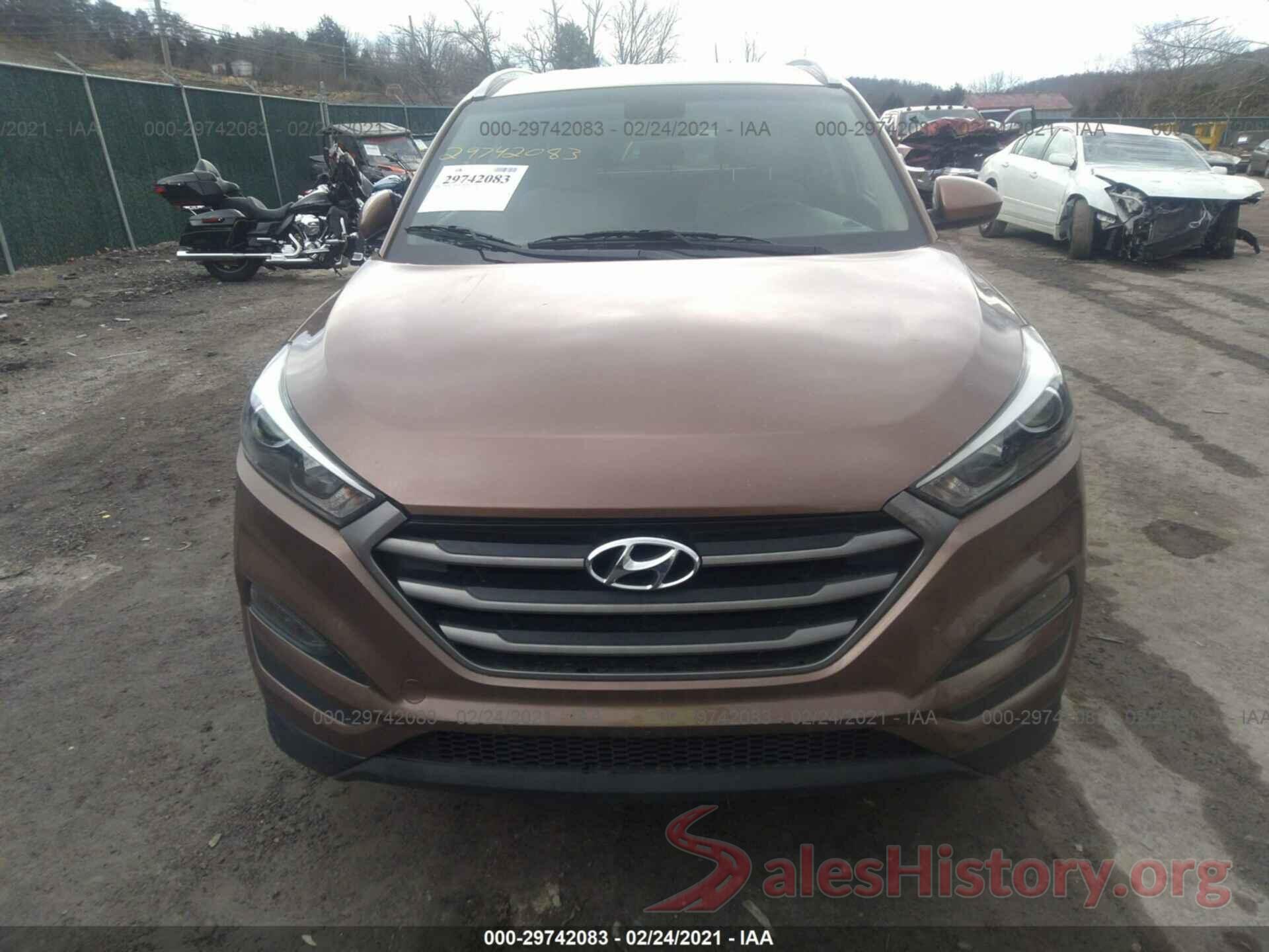 KM8J3CA48GU228566 2016 HYUNDAI TUCSON