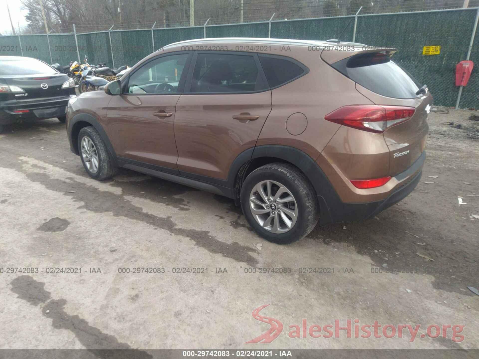 KM8J3CA48GU228566 2016 HYUNDAI TUCSON