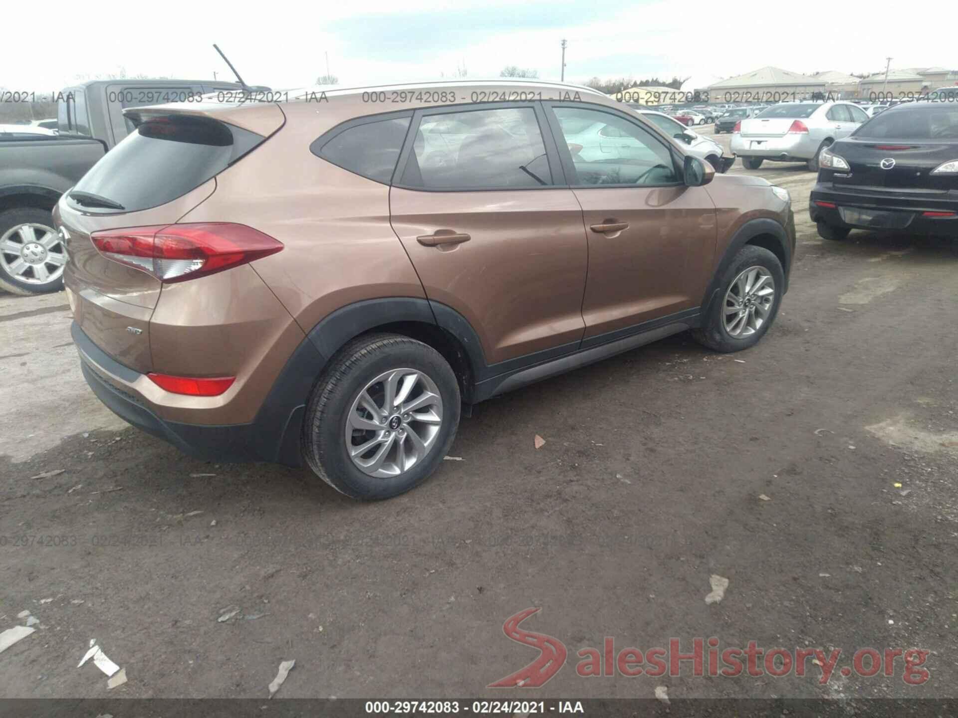 KM8J3CA48GU228566 2016 HYUNDAI TUCSON