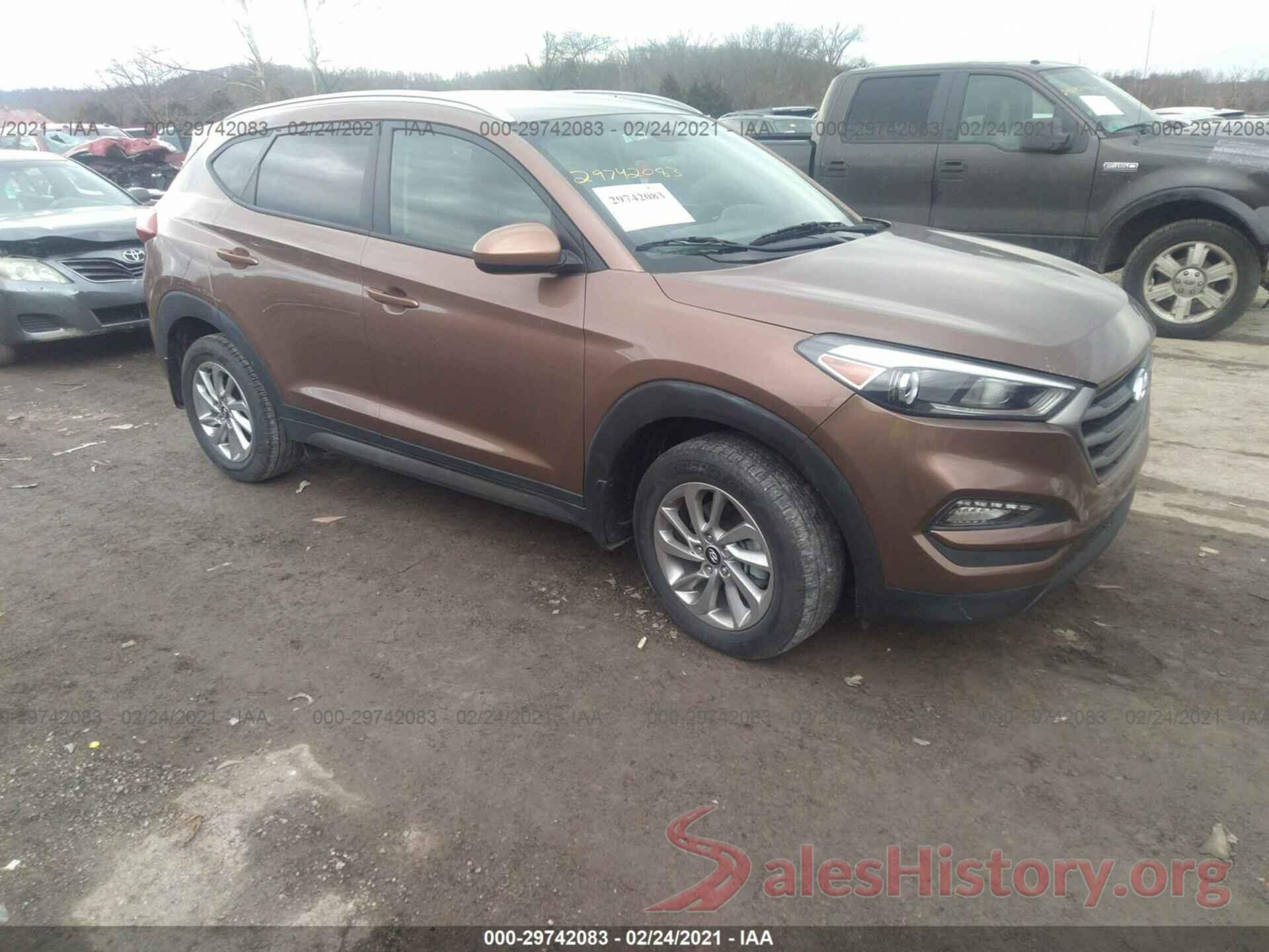 KM8J3CA48GU228566 2016 HYUNDAI TUCSON