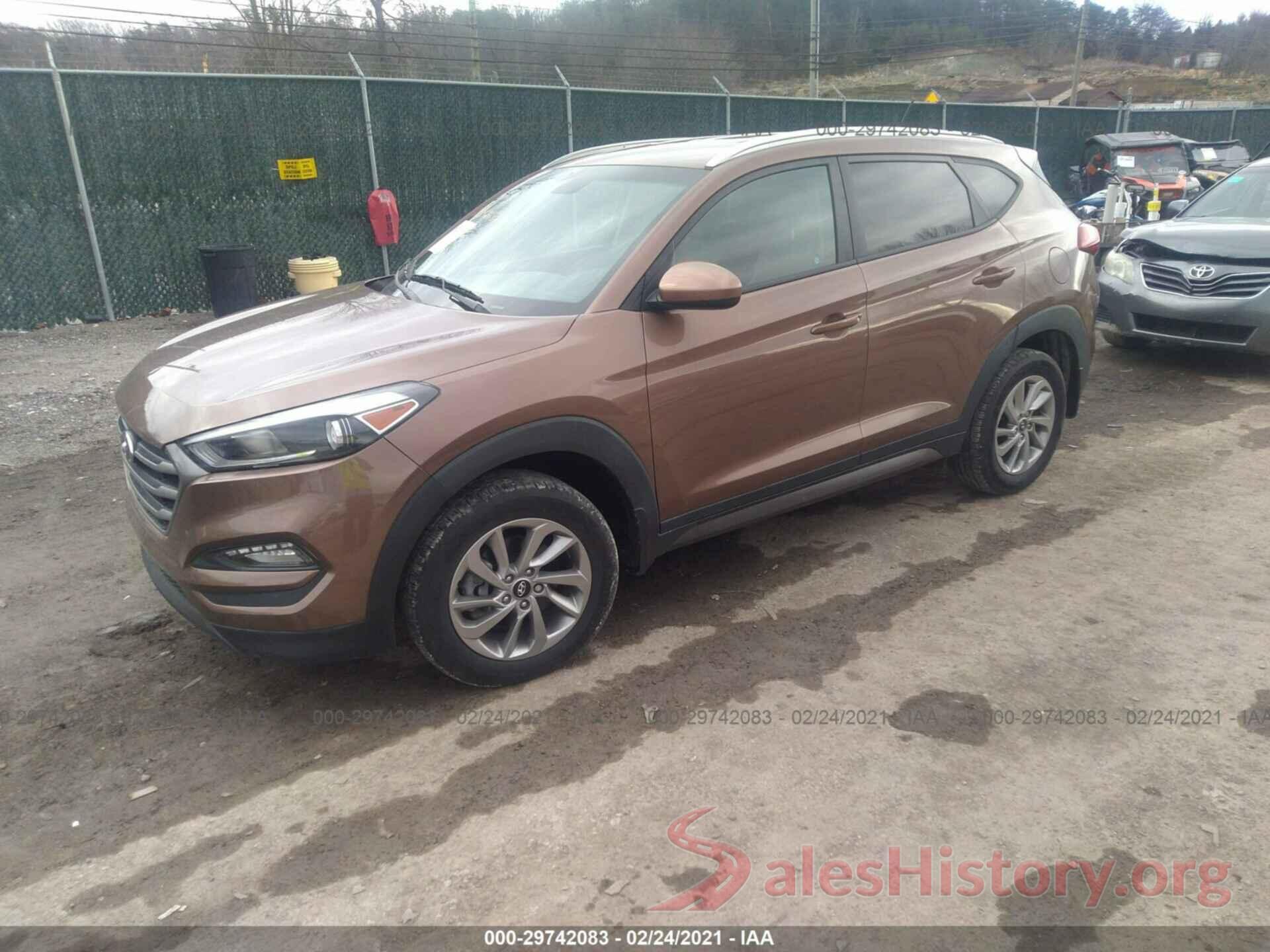 KM8J3CA48GU228566 2016 HYUNDAI TUCSON