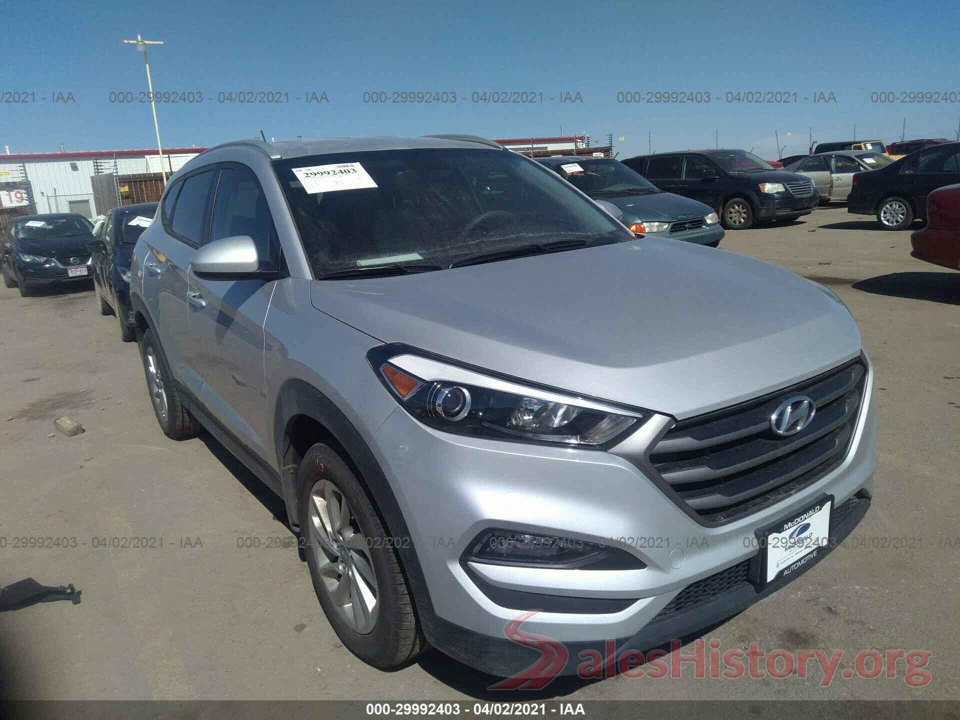 KM8J3CA49GU257381 2016 HYUNDAI TUCSON