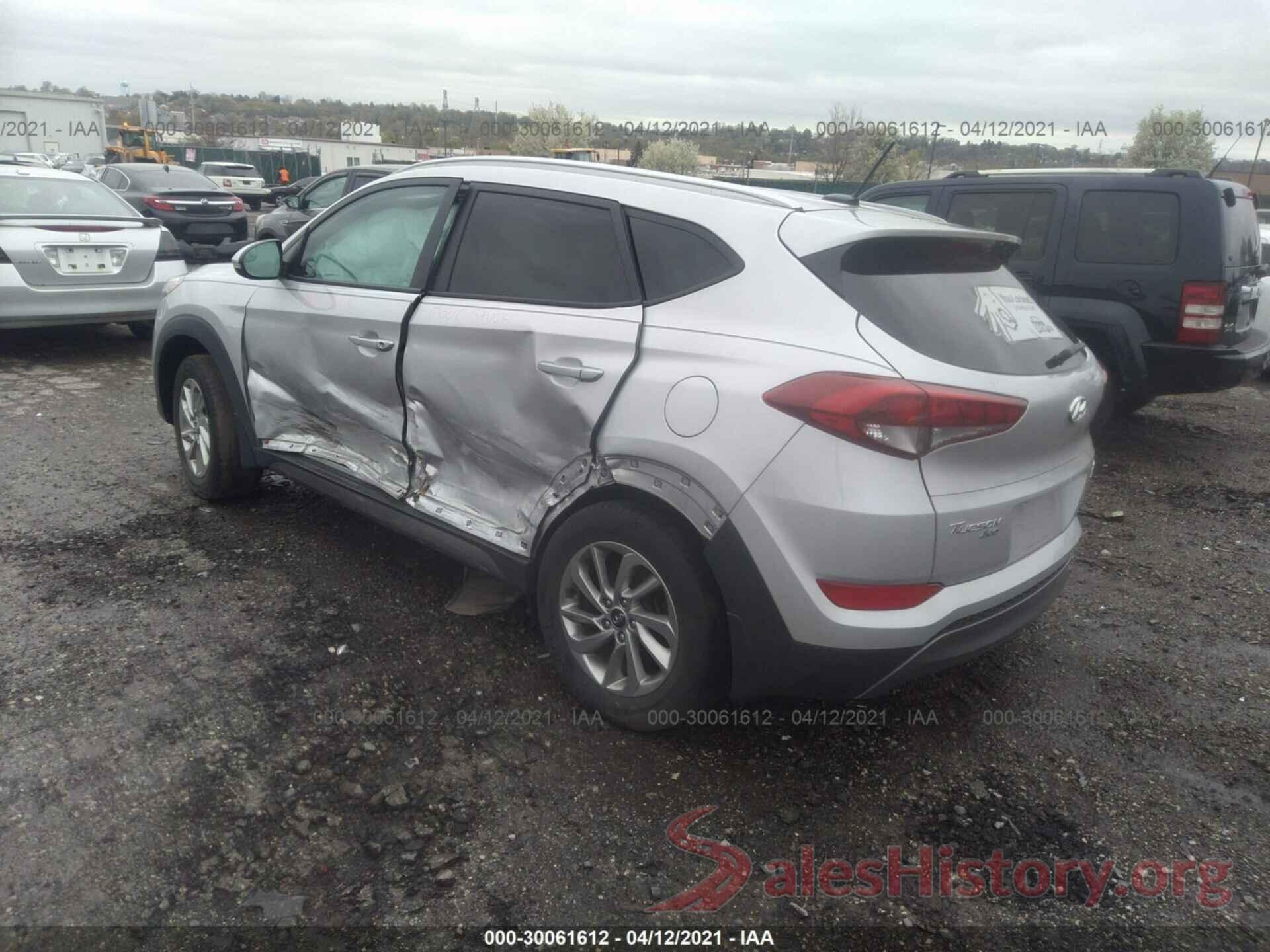 KM8J3CA24GU226750 2016 HYUNDAI TUCSON