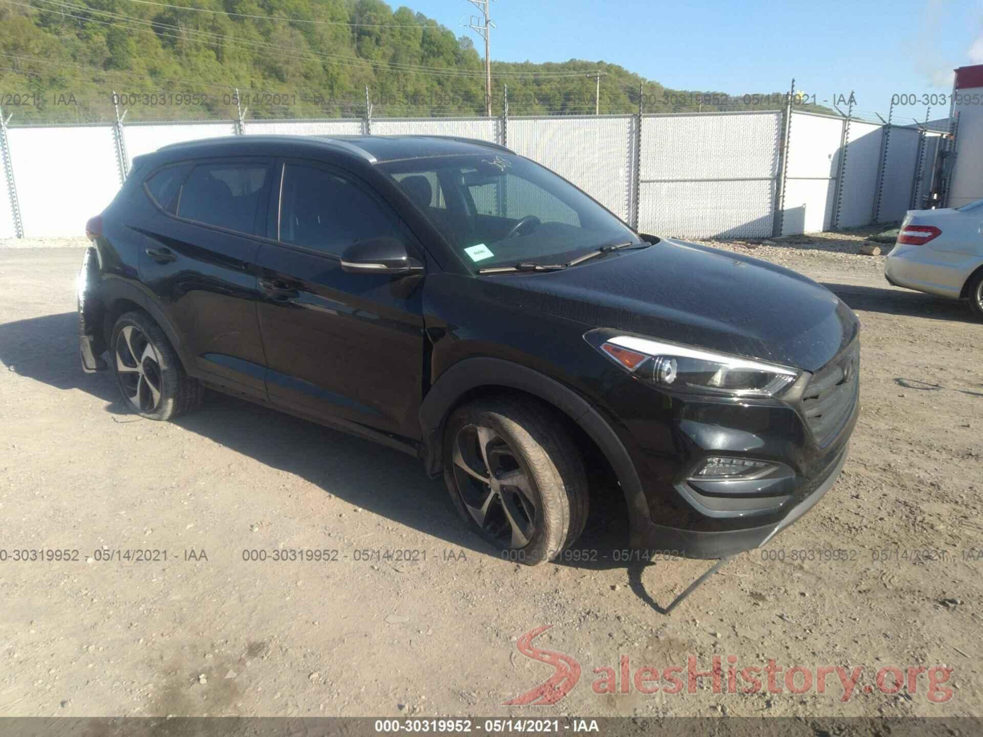 KM8J3CA25GU043048 2016 HYUNDAI TUCSON