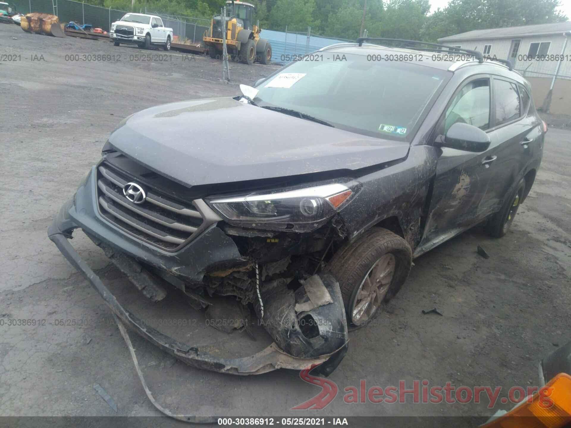 KM8J3CA44GU210484 2016 HYUNDAI TUCSON