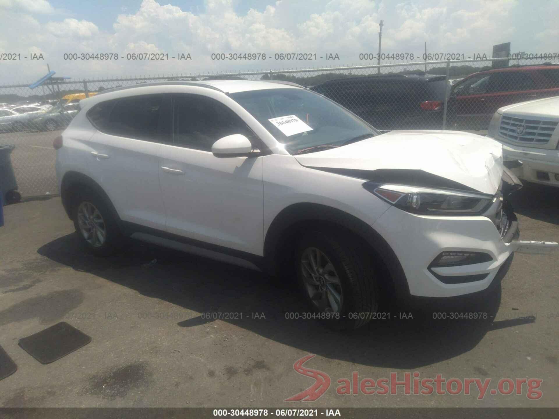 KM8J3CA48JU639912 2018 HYUNDAI TUCSON