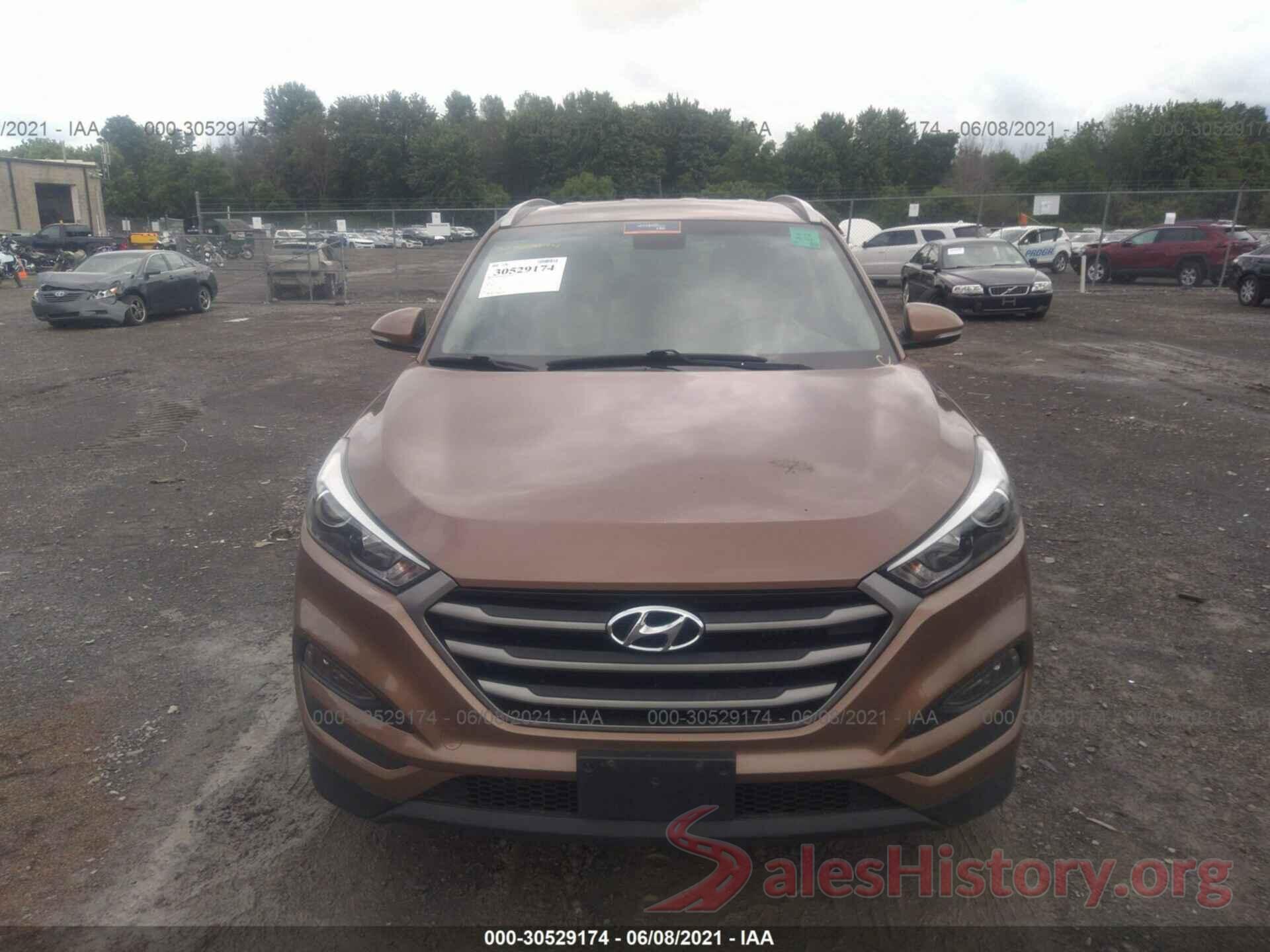 KM8J3CA2XGU075378 2016 HYUNDAI TUCSON