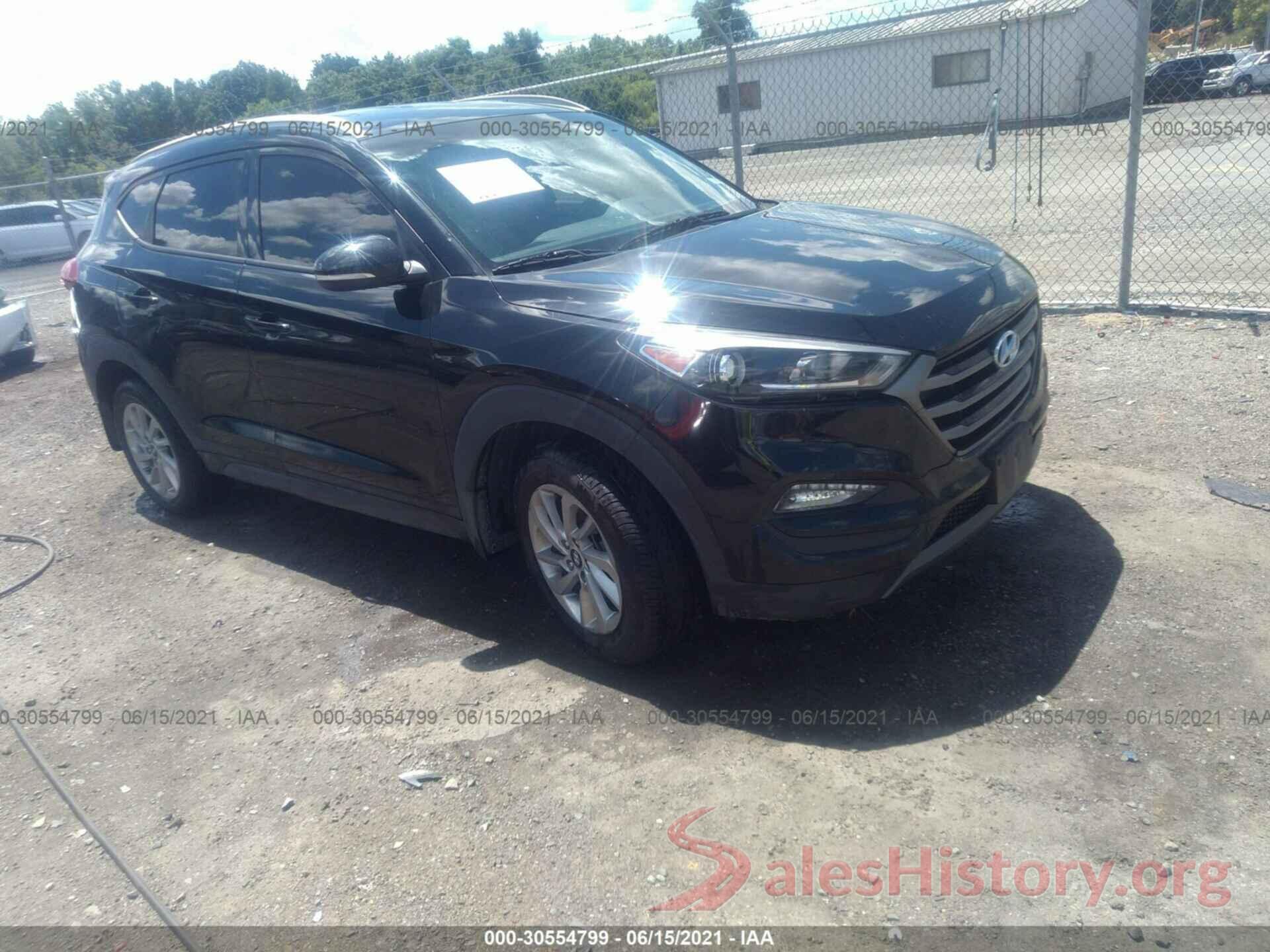 KM8J3CA23GU050595 2016 HYUNDAI TUCSON