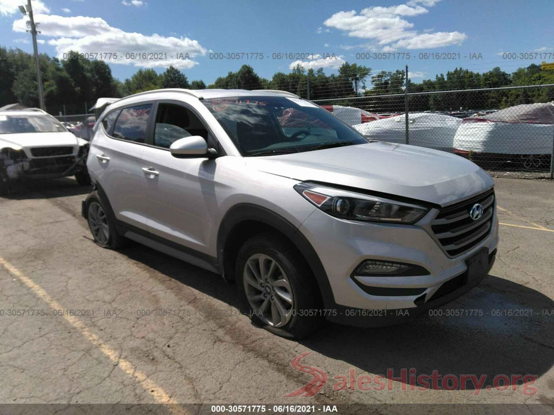 KM8J3CA40JU788296 2018 HYUNDAI TUCSON