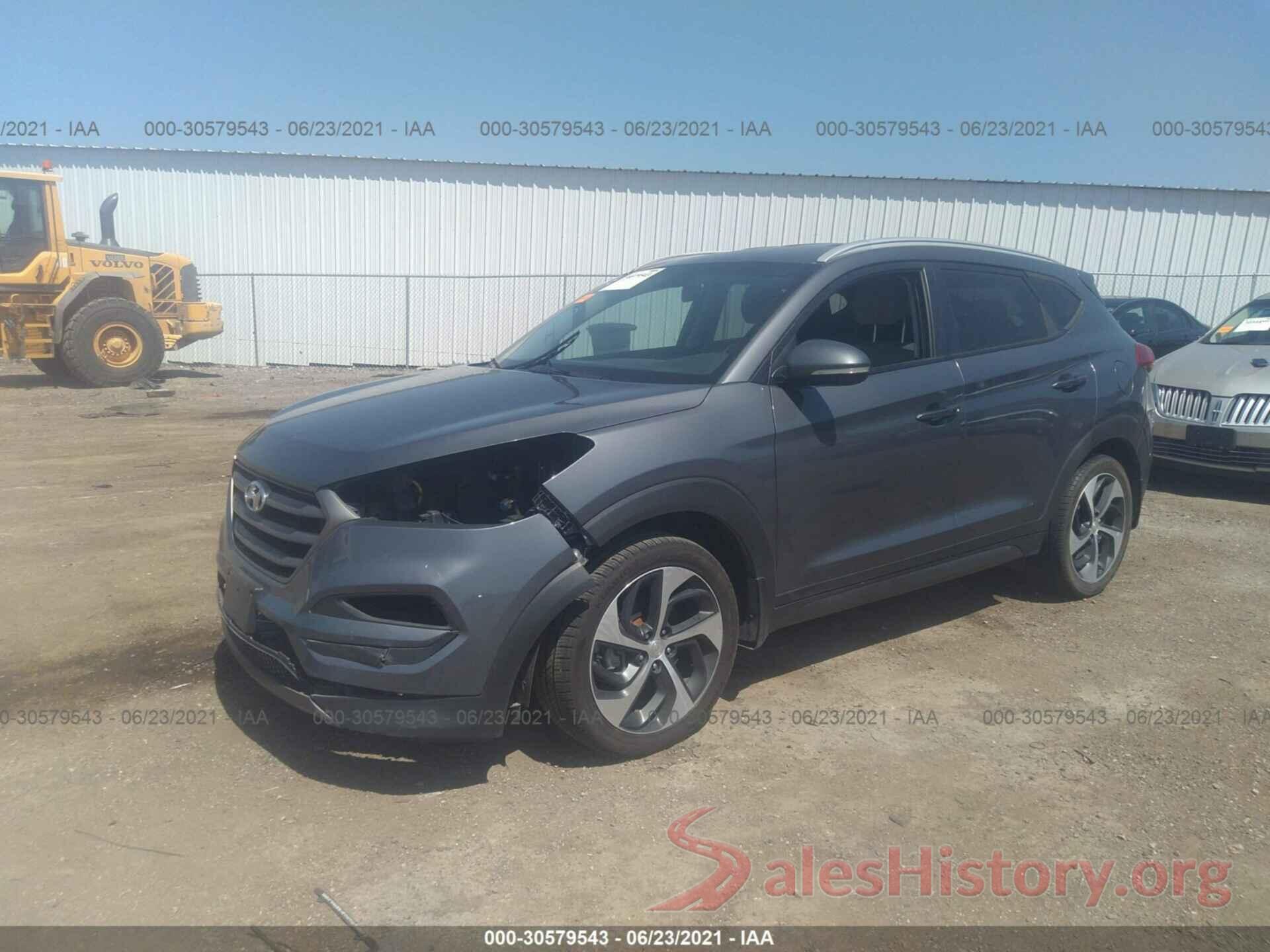 KM8J3CA2XGU058077 2016 HYUNDAI TUCSON