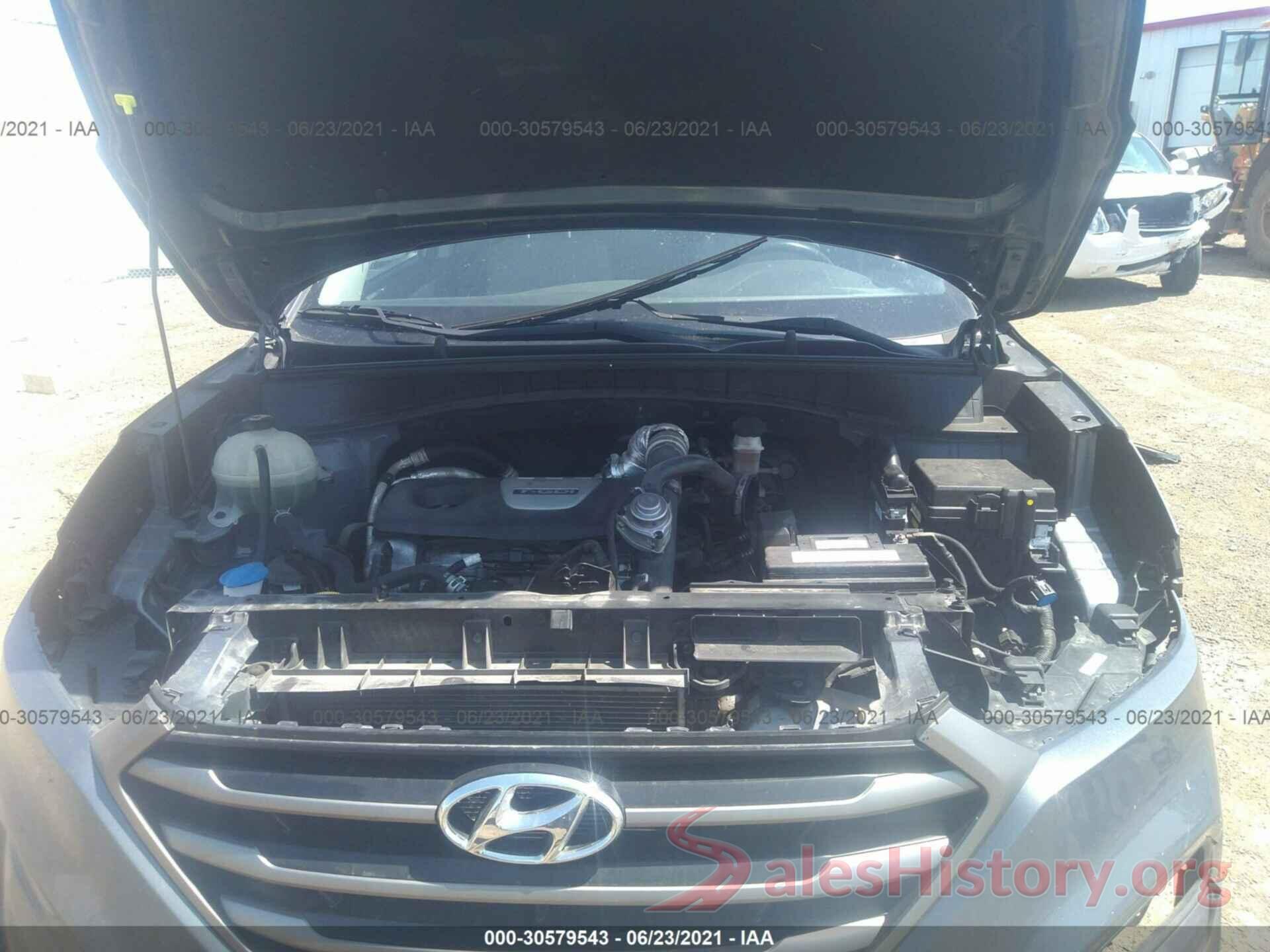 KM8J3CA2XGU058077 2016 HYUNDAI TUCSON