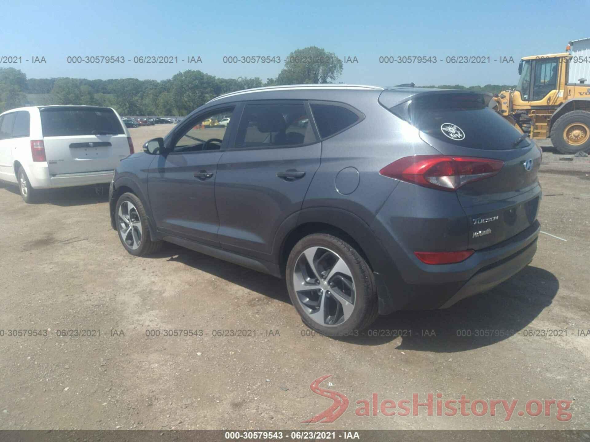 KM8J3CA2XGU058077 2016 HYUNDAI TUCSON