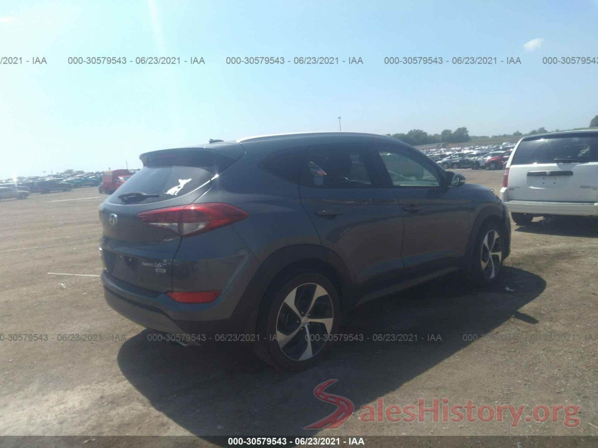 KM8J3CA2XGU058077 2016 HYUNDAI TUCSON