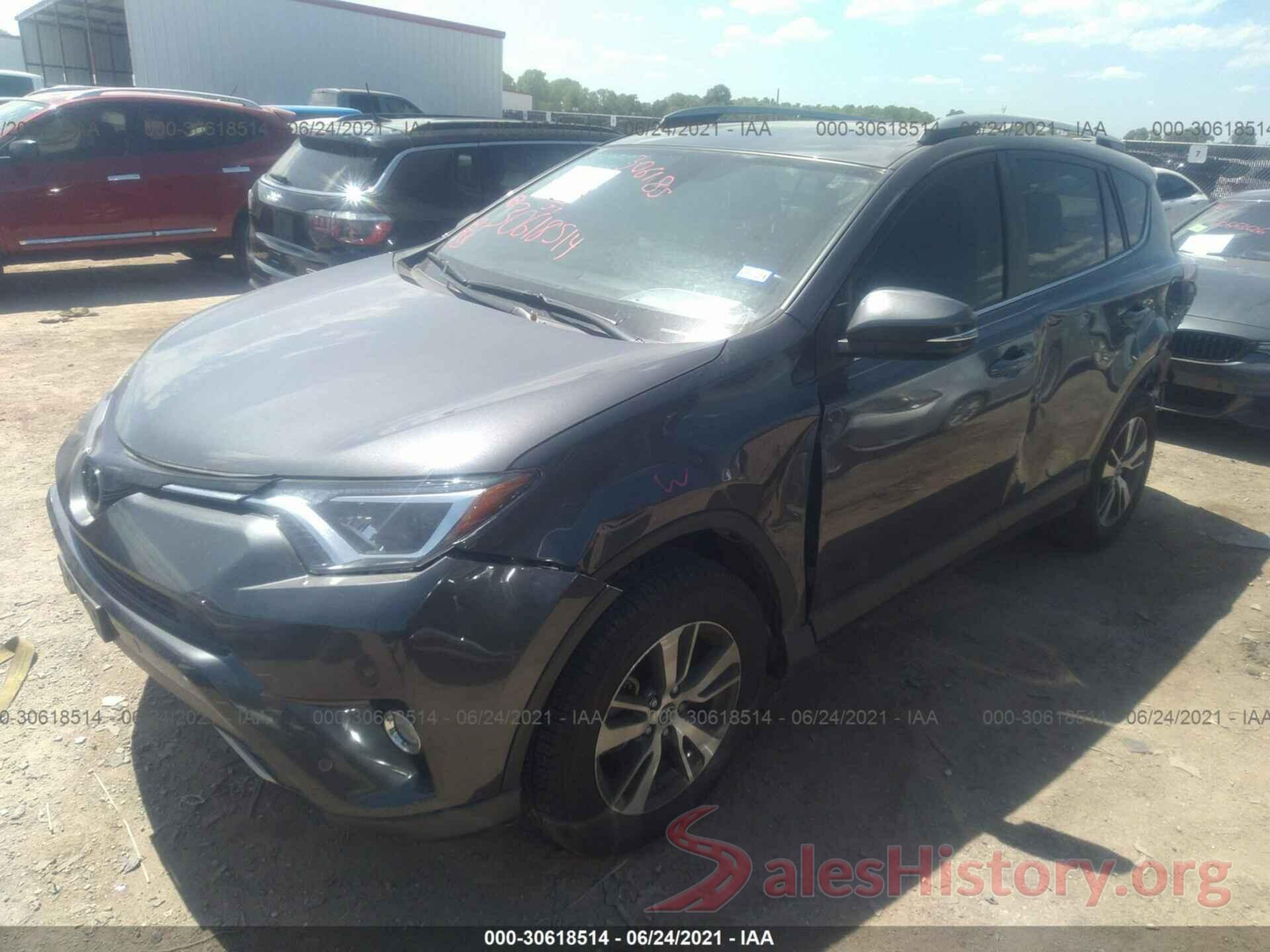 JTMWFREV0JJ202009 2018 TOYOTA RAV4