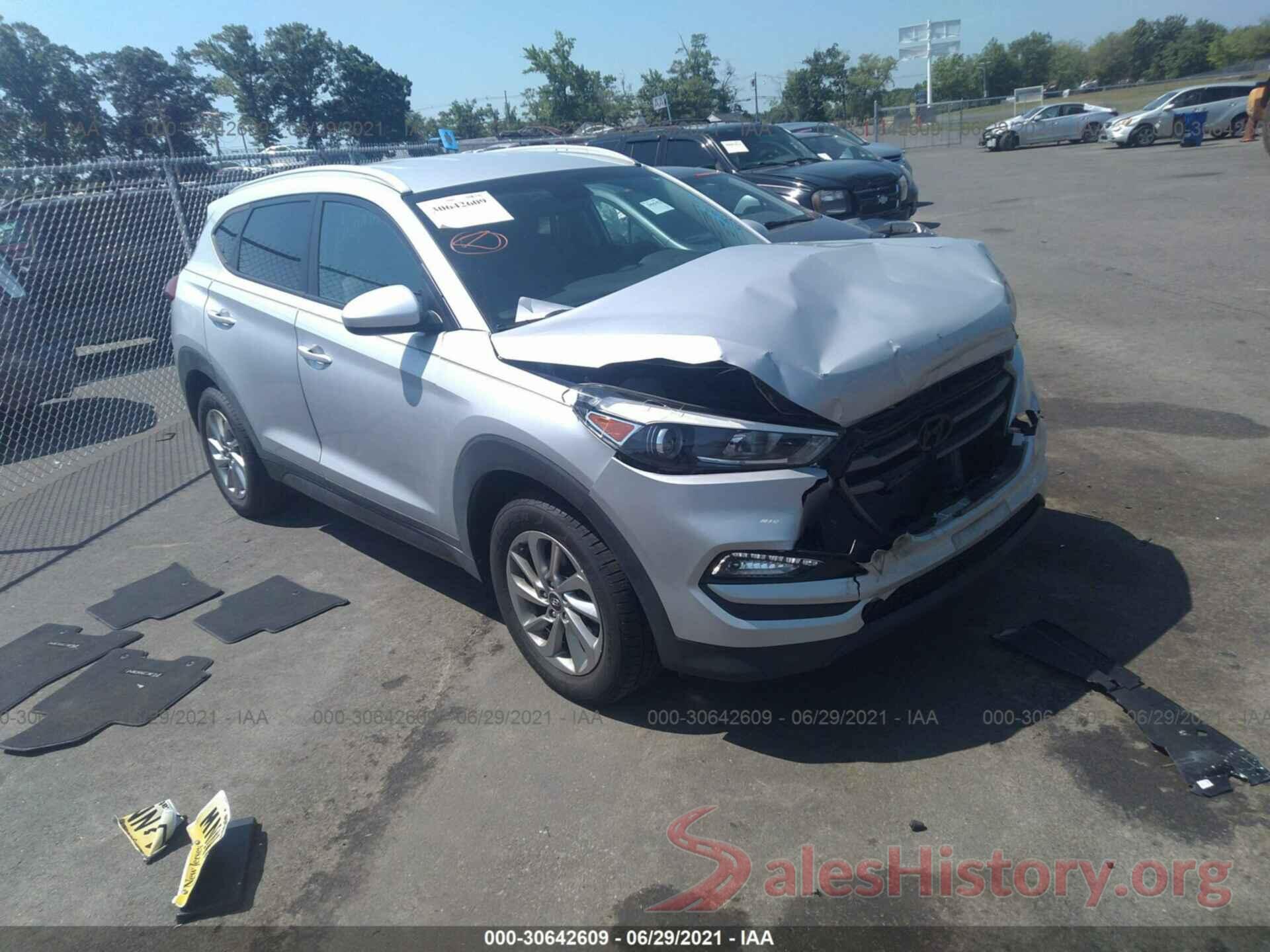 KM8J3CA48GU129312 2016 HYUNDAI TUCSON