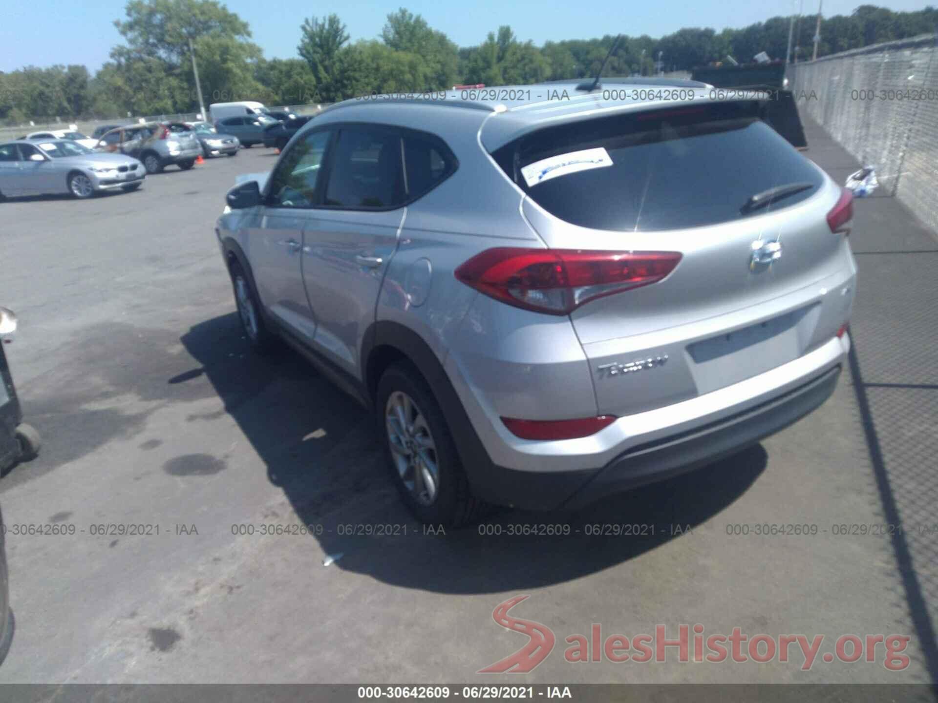 KM8J3CA48GU129312 2016 HYUNDAI TUCSON