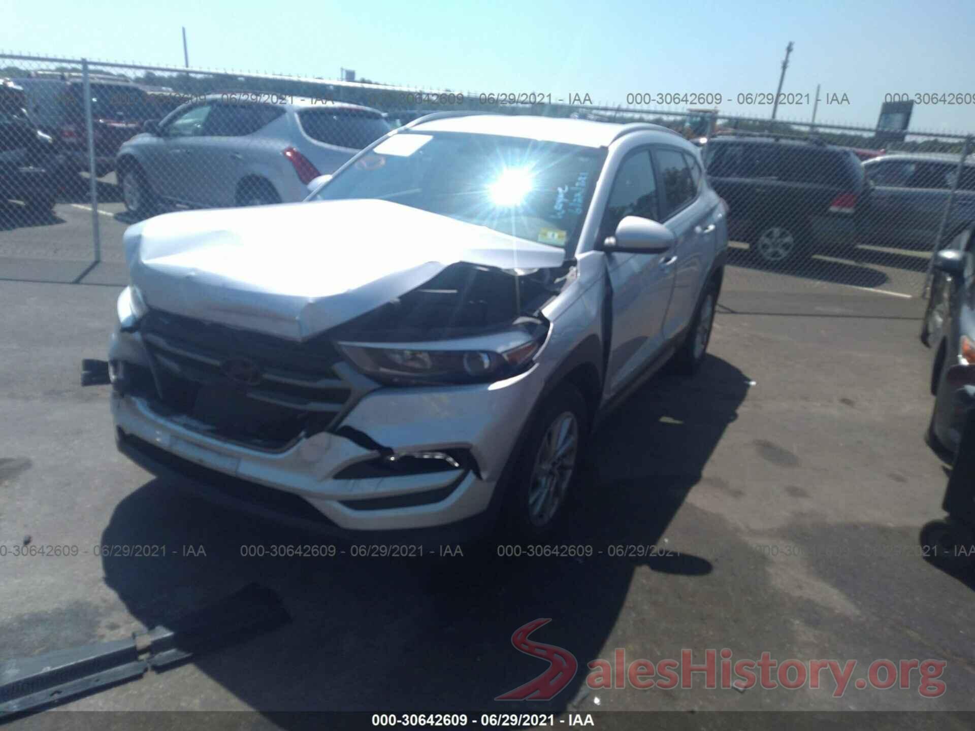 KM8J3CA48GU129312 2016 HYUNDAI TUCSON