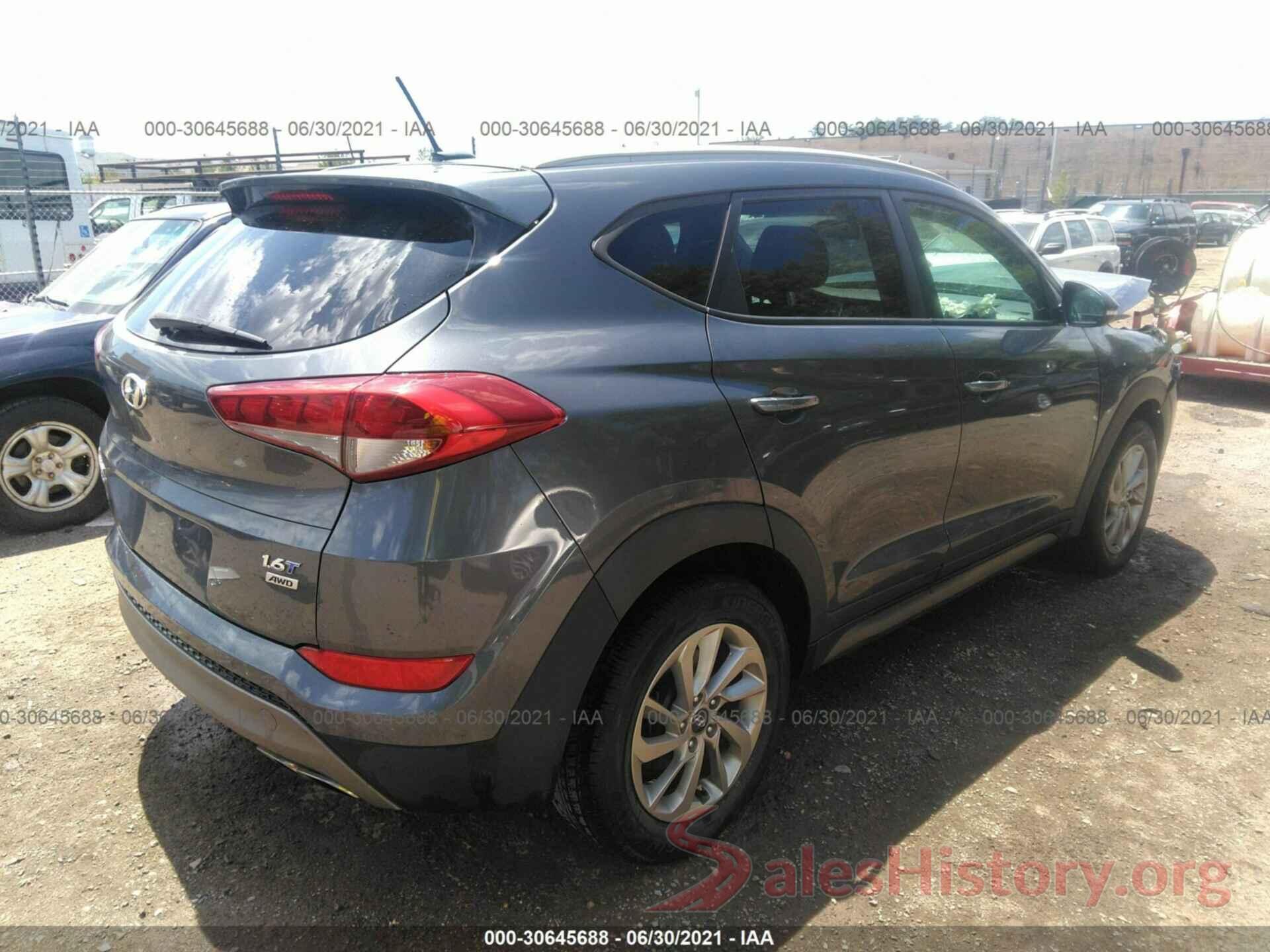 KM8J3CA2XGU186996 2016 HYUNDAI TUCSON