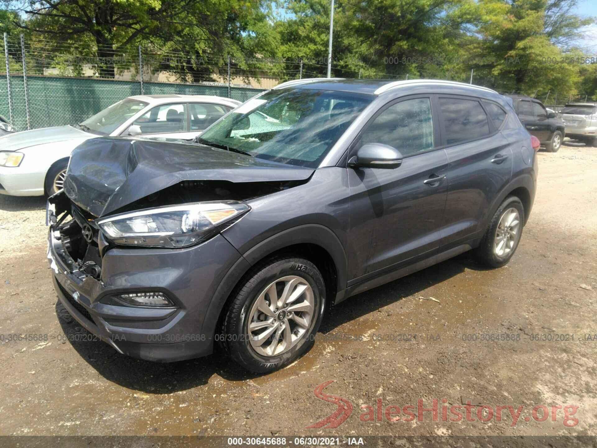 KM8J3CA2XGU186996 2016 HYUNDAI TUCSON