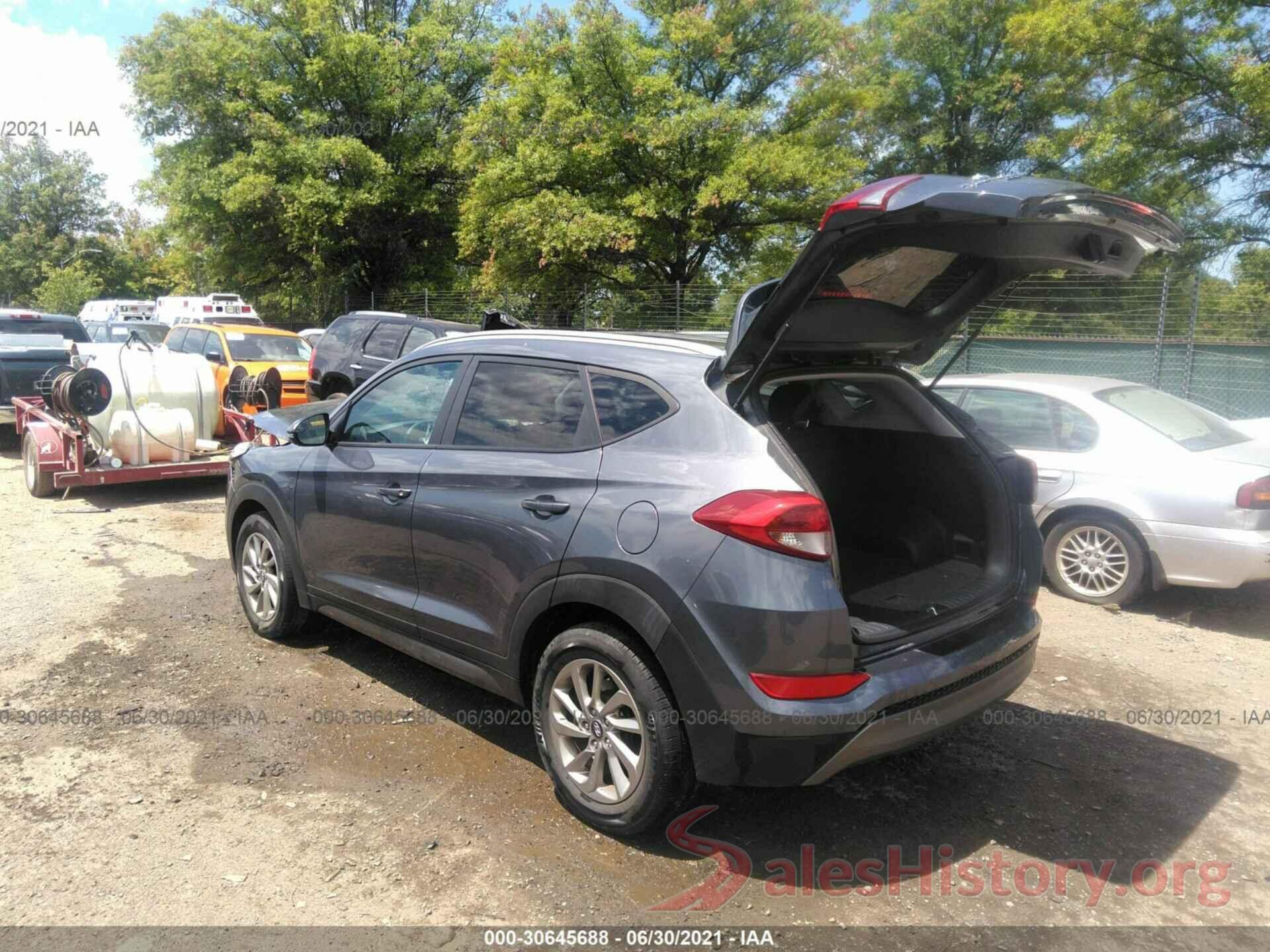 KM8J3CA2XGU186996 2016 HYUNDAI TUCSON