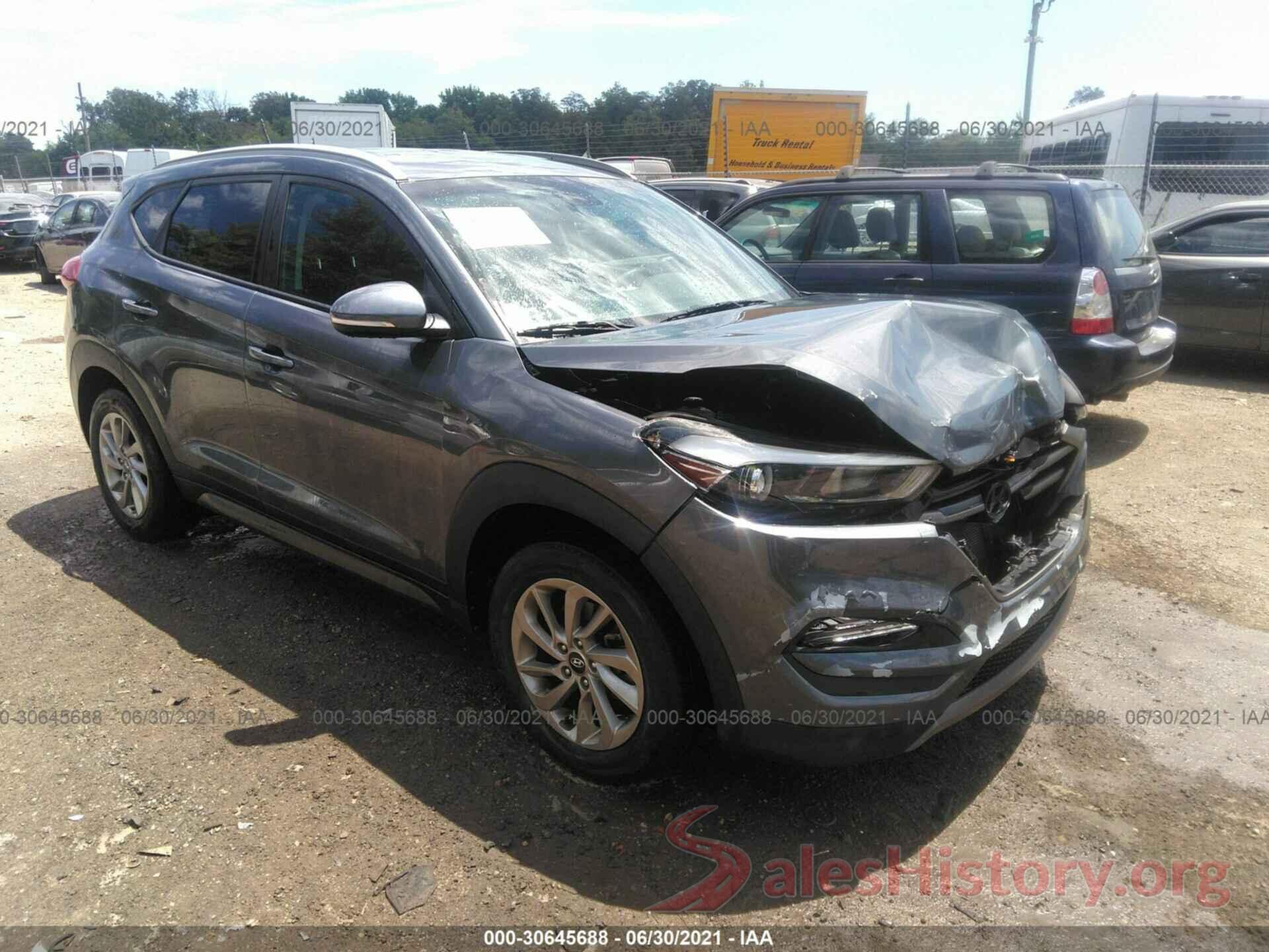 KM8J3CA2XGU186996 2016 HYUNDAI TUCSON