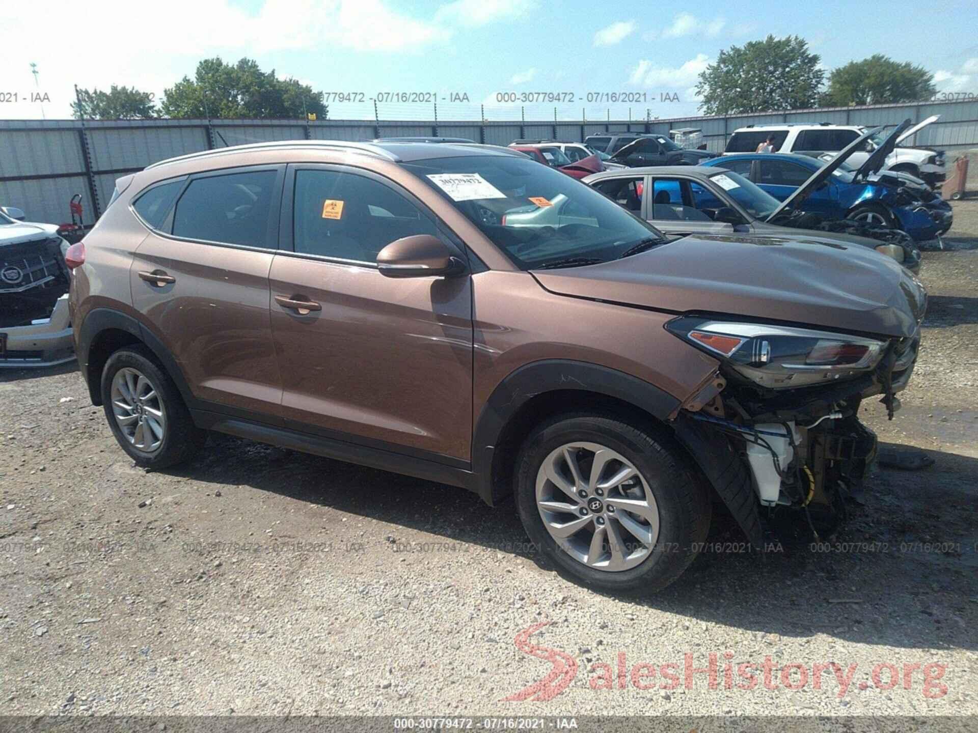 KM8J3CA2XGU084002 2016 HYUNDAI TUCSON