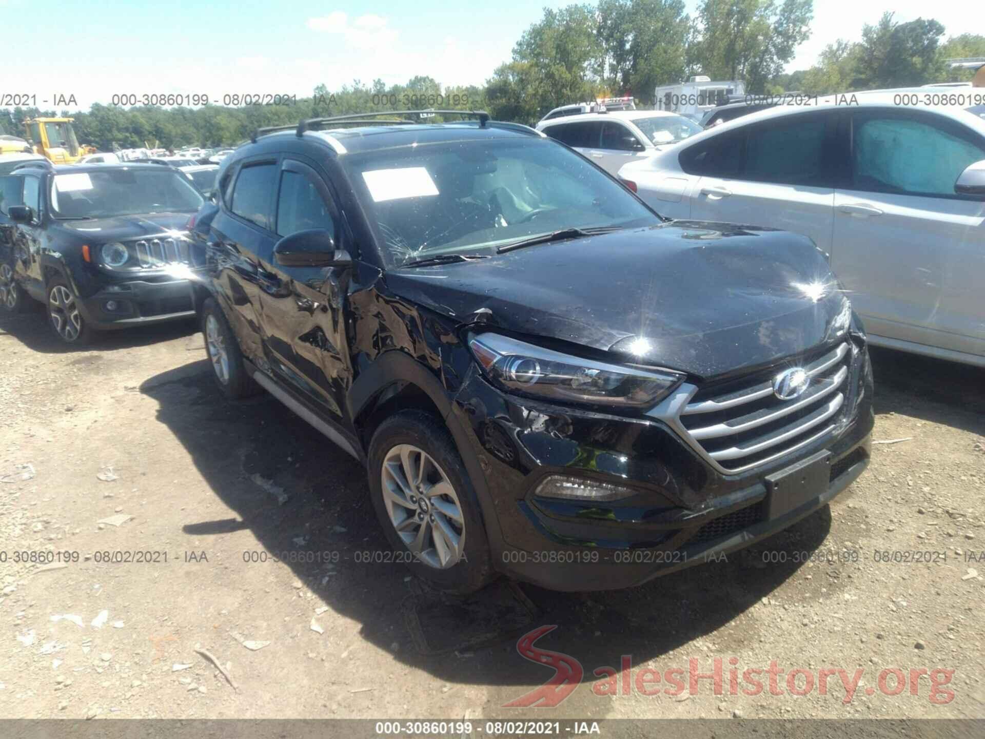 KM8J3CA4XJU697908 2018 HYUNDAI TUCSON