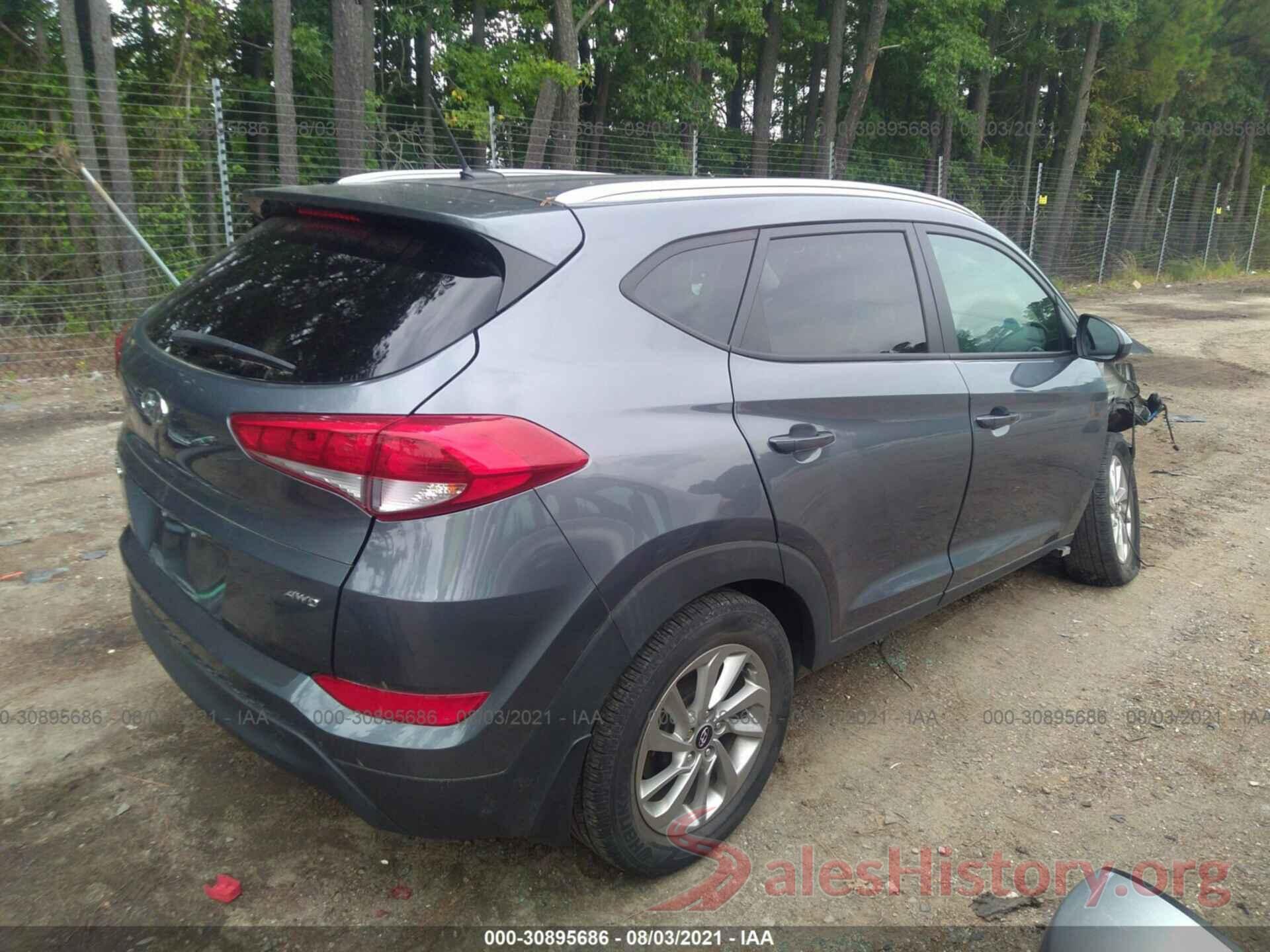 KM8J3CA48GU084064 2016 HYUNDAI TUCSON