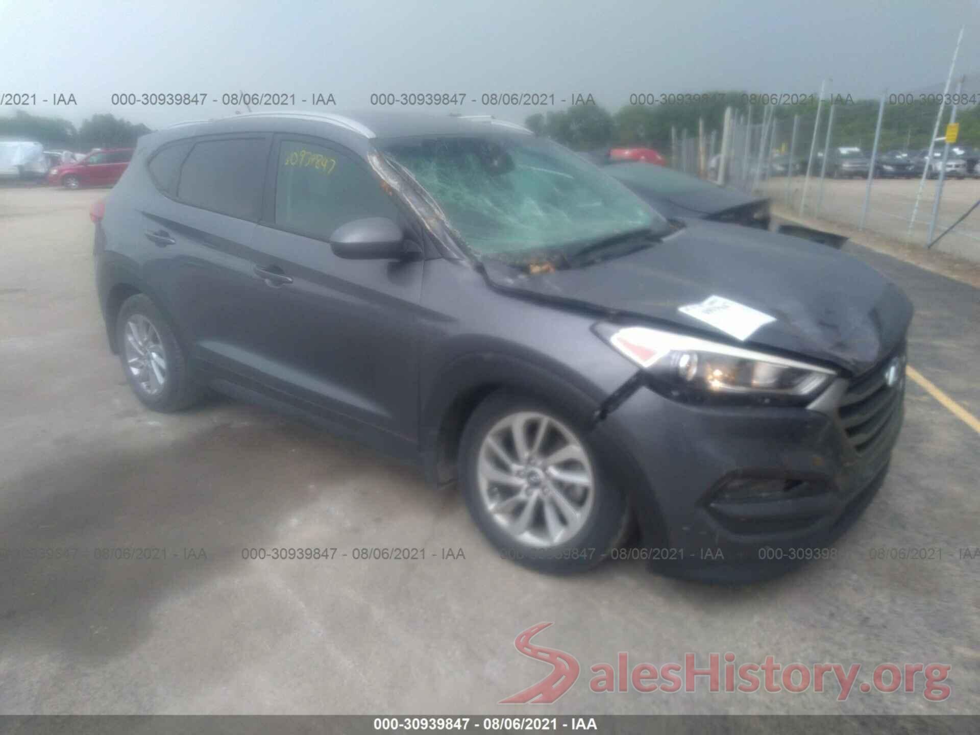 KM8J3CA44GU210971 2016 HYUNDAI TUCSON