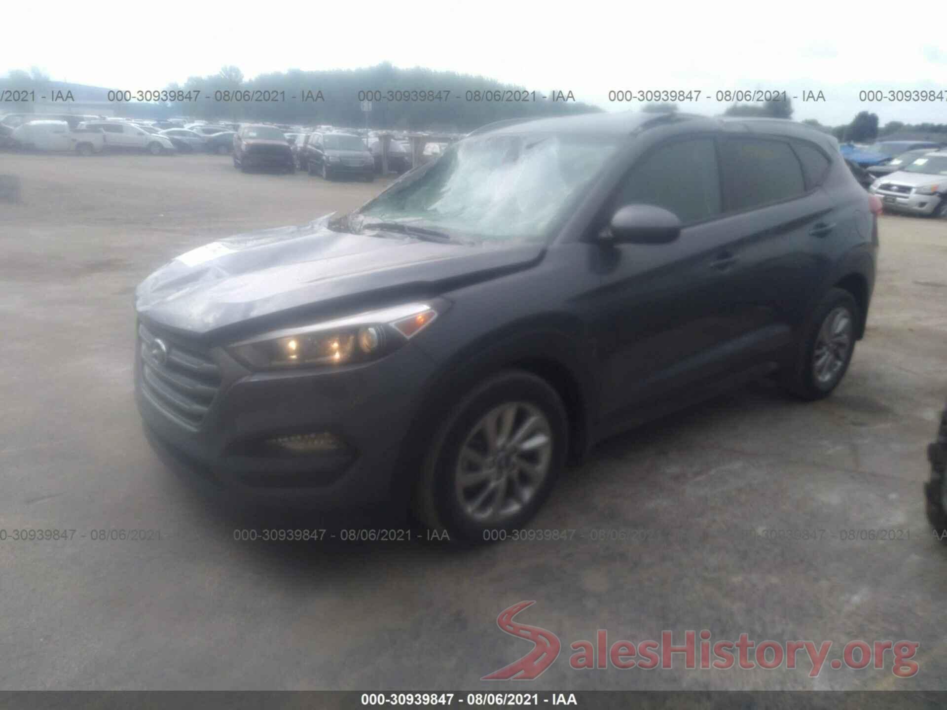 KM8J3CA44GU210971 2016 HYUNDAI TUCSON